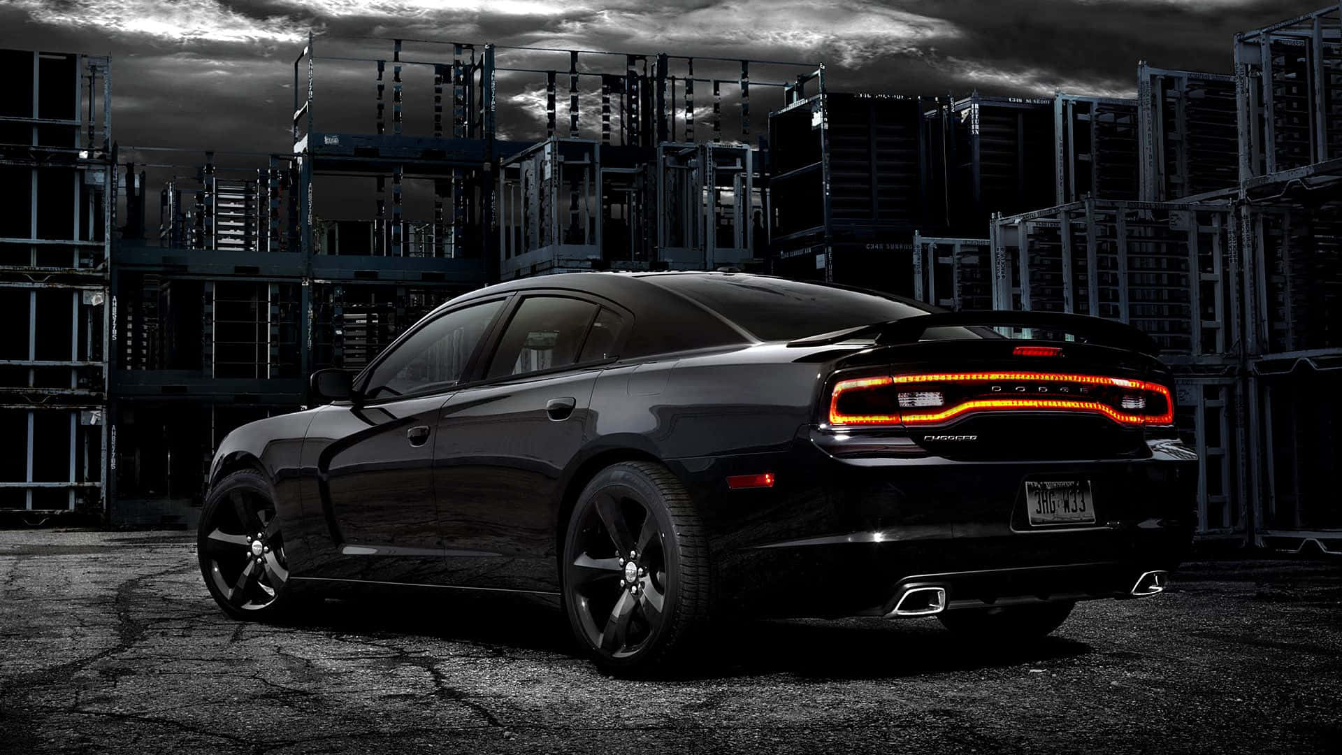 Sleek and Powerful Dodge Charger on the Road Wallpaper