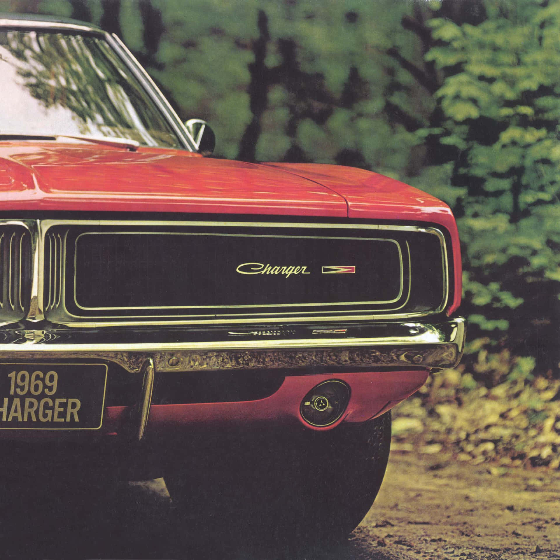 Sleek Dodge Charger on Aesthetic Background Wallpaper