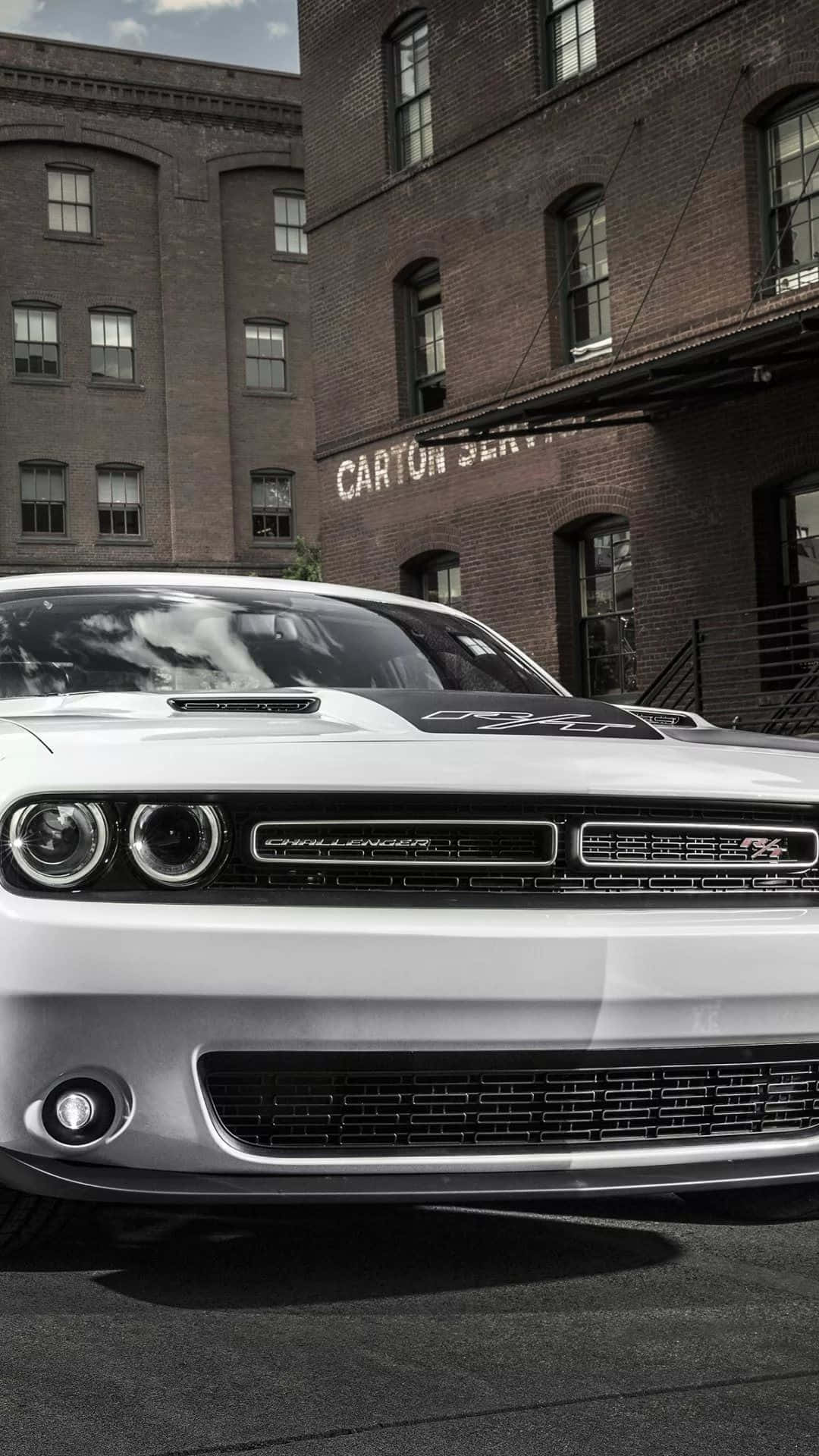 Experience style and power with the Dodge Charger IPhone Wallpaper