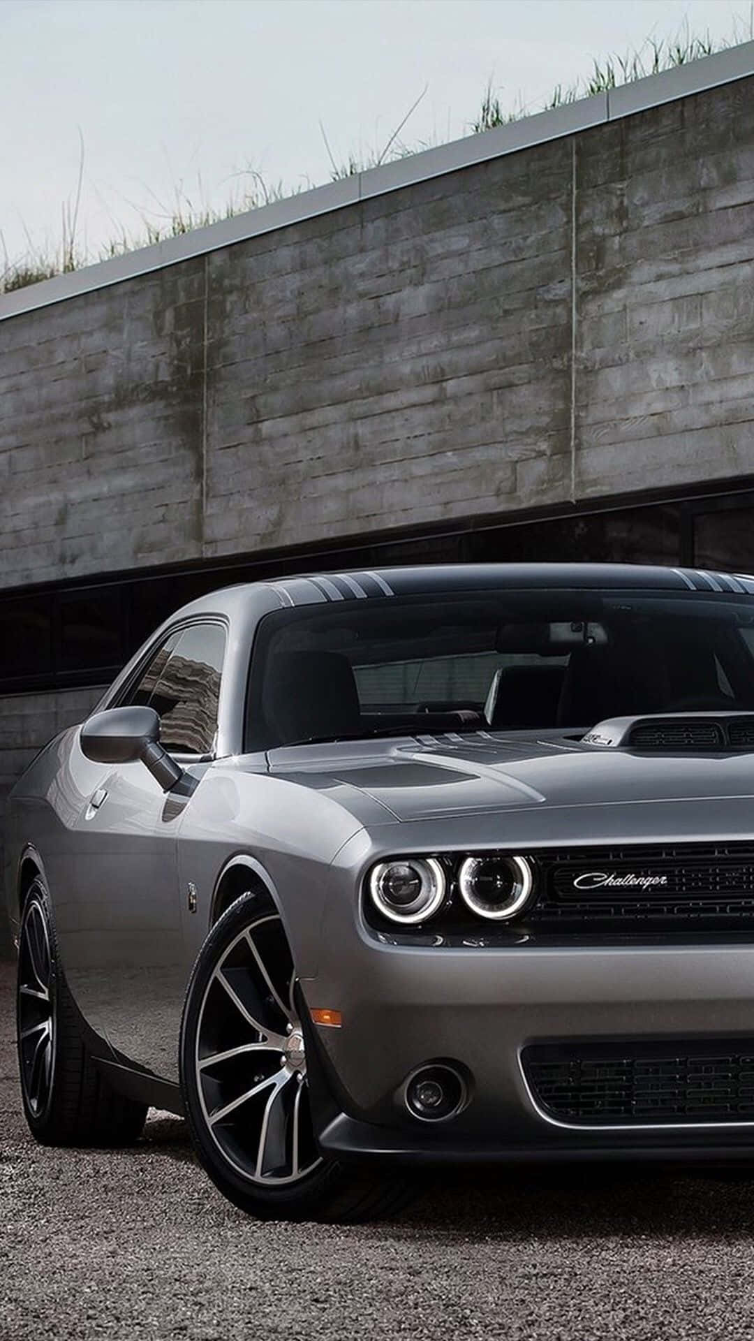 "Feel the power of the Dodge Charger with this exclusive iPhone wallpaper.” Wallpaper