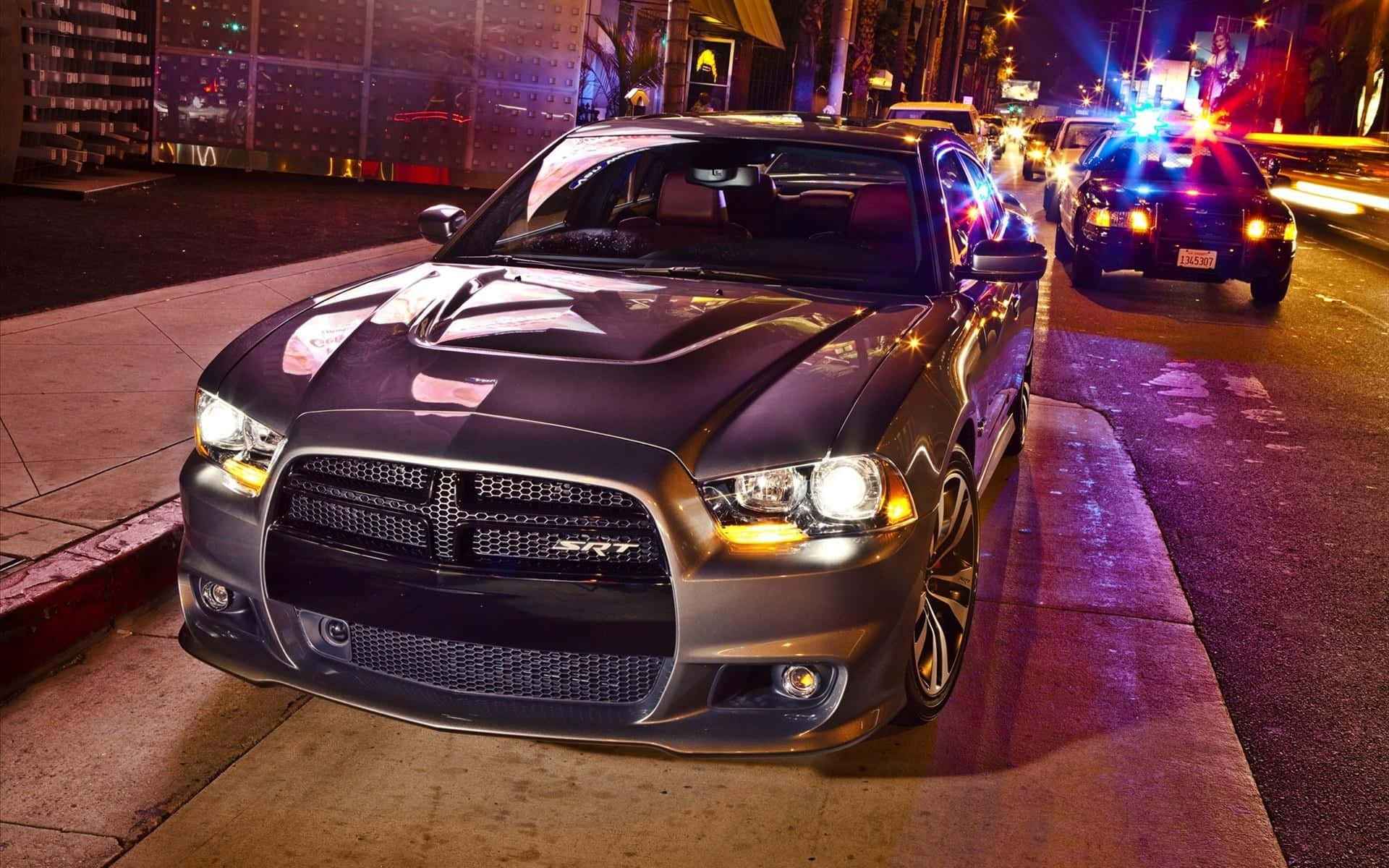 Dodge Charger Police Pursuit Night Scene Wallpaper
