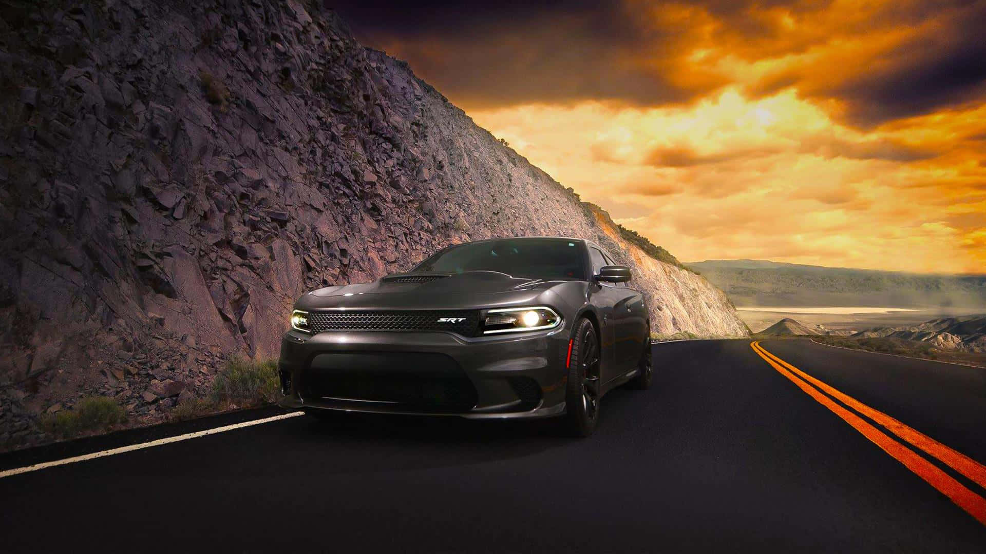 Dodge_ Charger_ S R T_ On_ Mountain_ Road Wallpaper