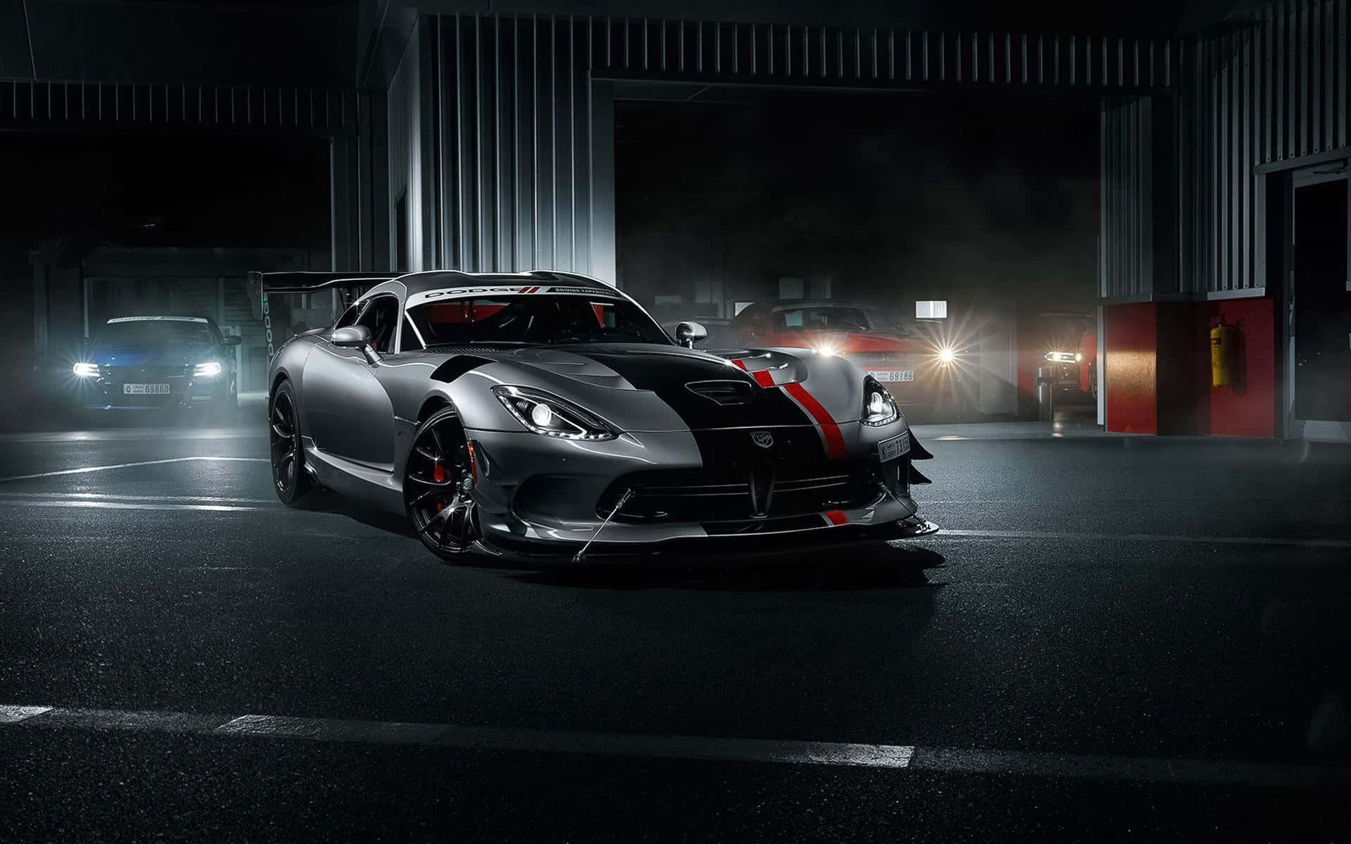 Enjoy the thrill of beastly power with the Dodge Viper Wallpaper