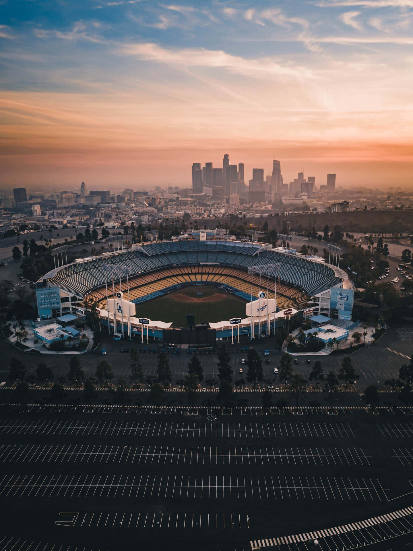 Beautiful Los Angeles skyline with Dodger Stadium in the foreground Wallpaper