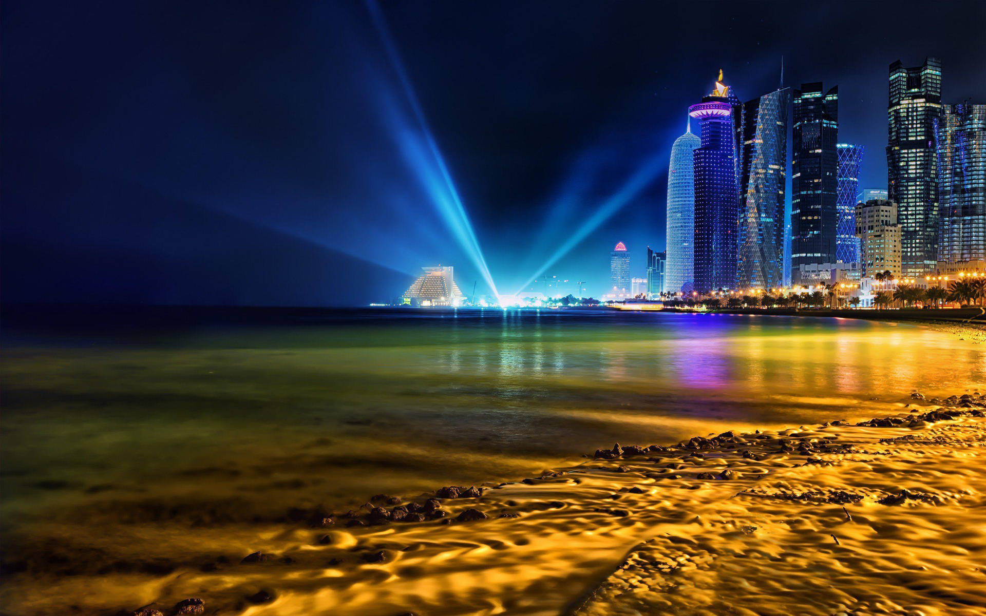 Nottesulla Spiaggia Di Doha Sfondo