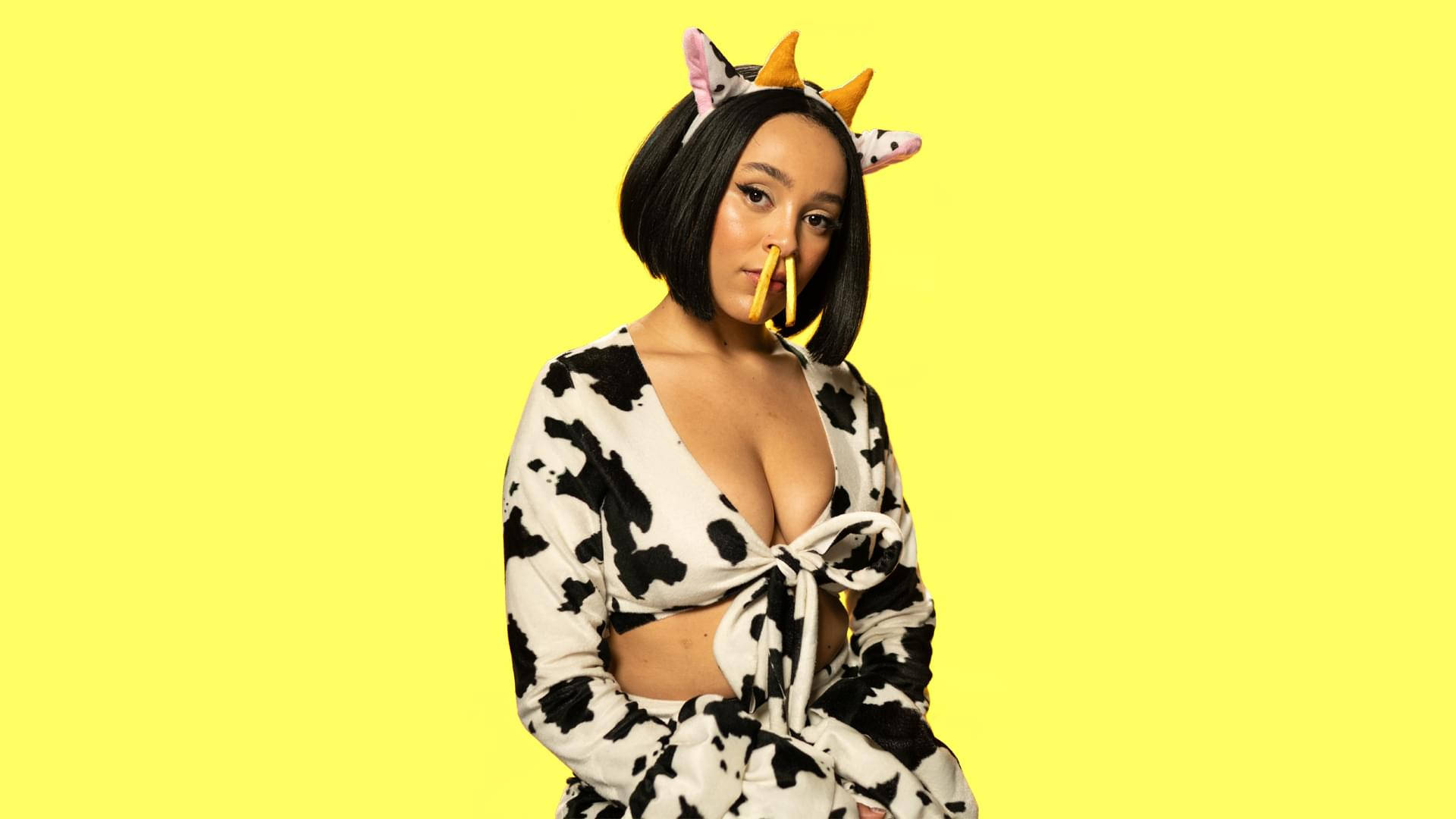 Doja Cat Cow Costume Background