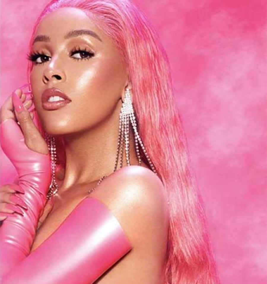 Singer and songwriter Doja Cat performing in Concert