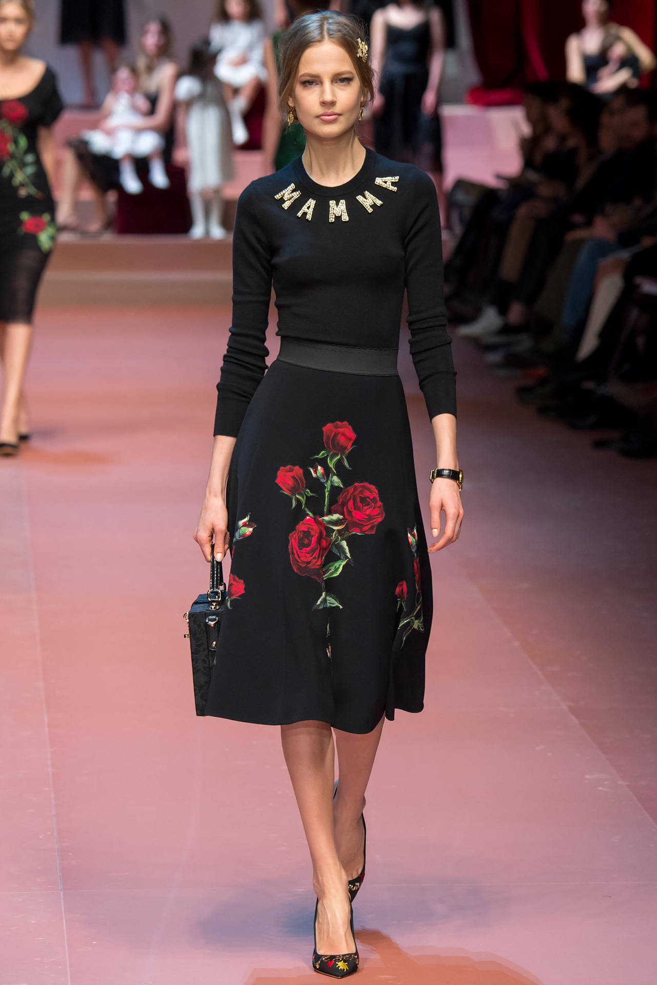 Dolce And Gabbana Model In Black Flowery Dress Wallpaper
