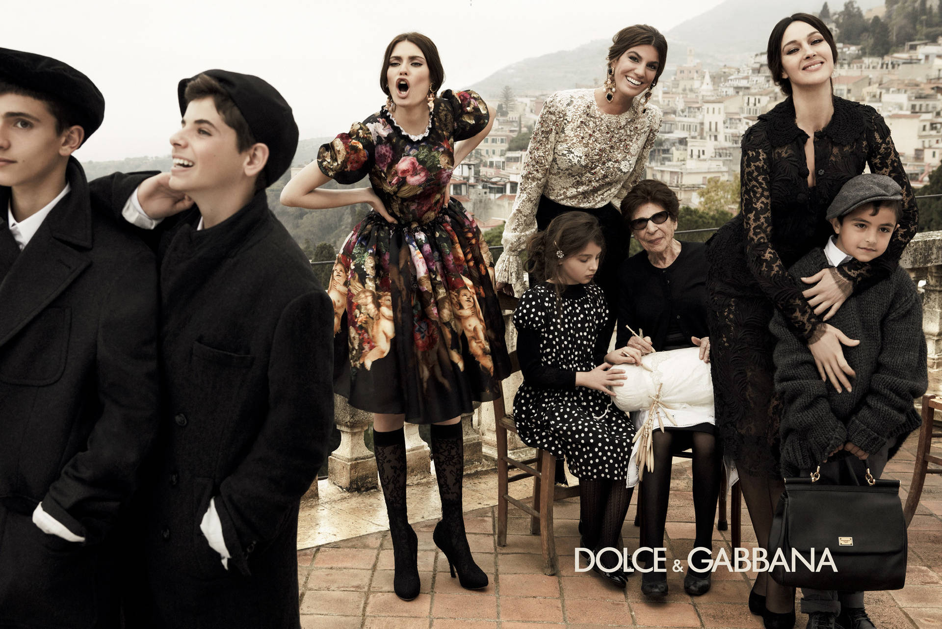 Dolce And Gabbana Models Outside In Black Clothing Wallpaper