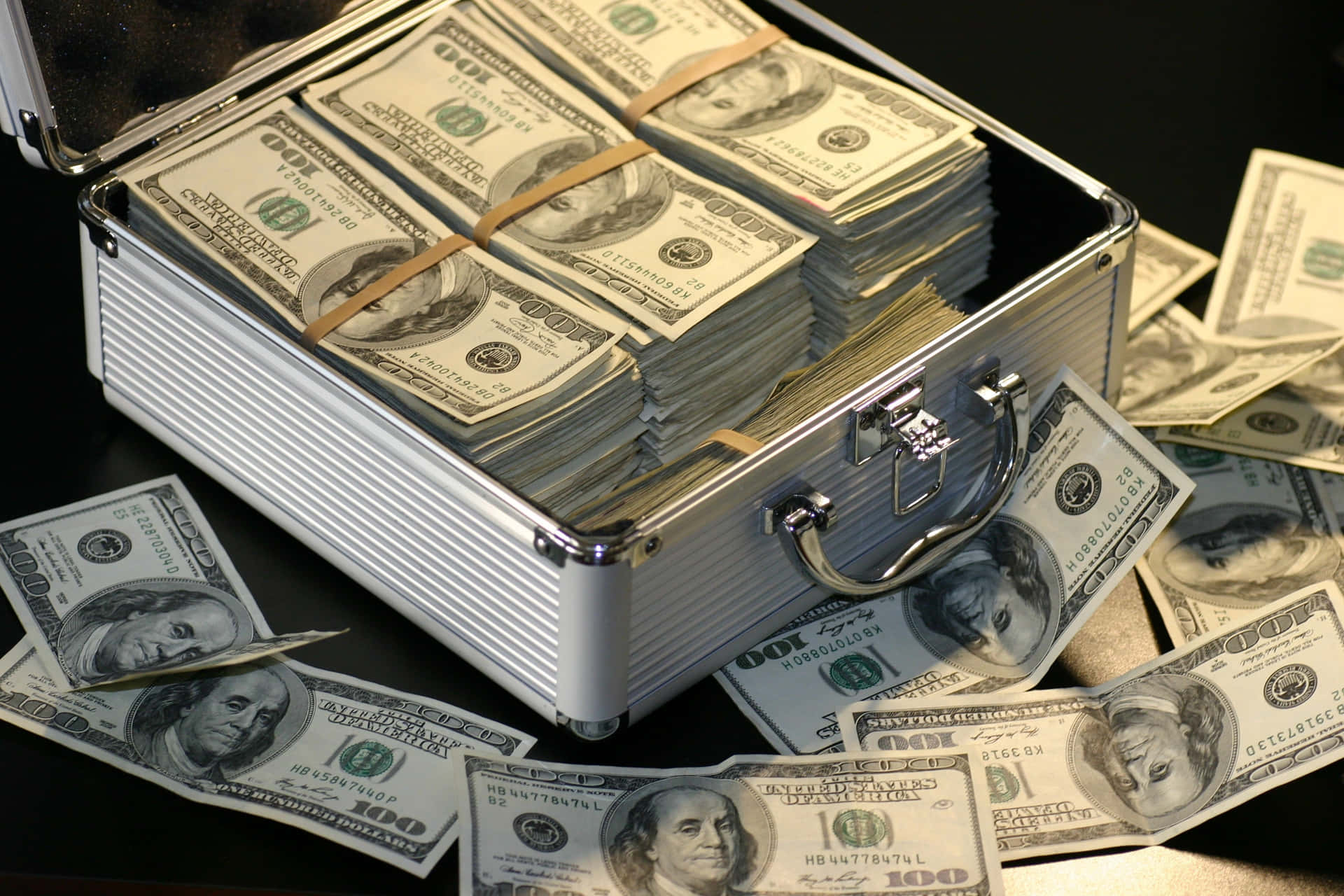 US Dollar Bills On Suitcase Picture
