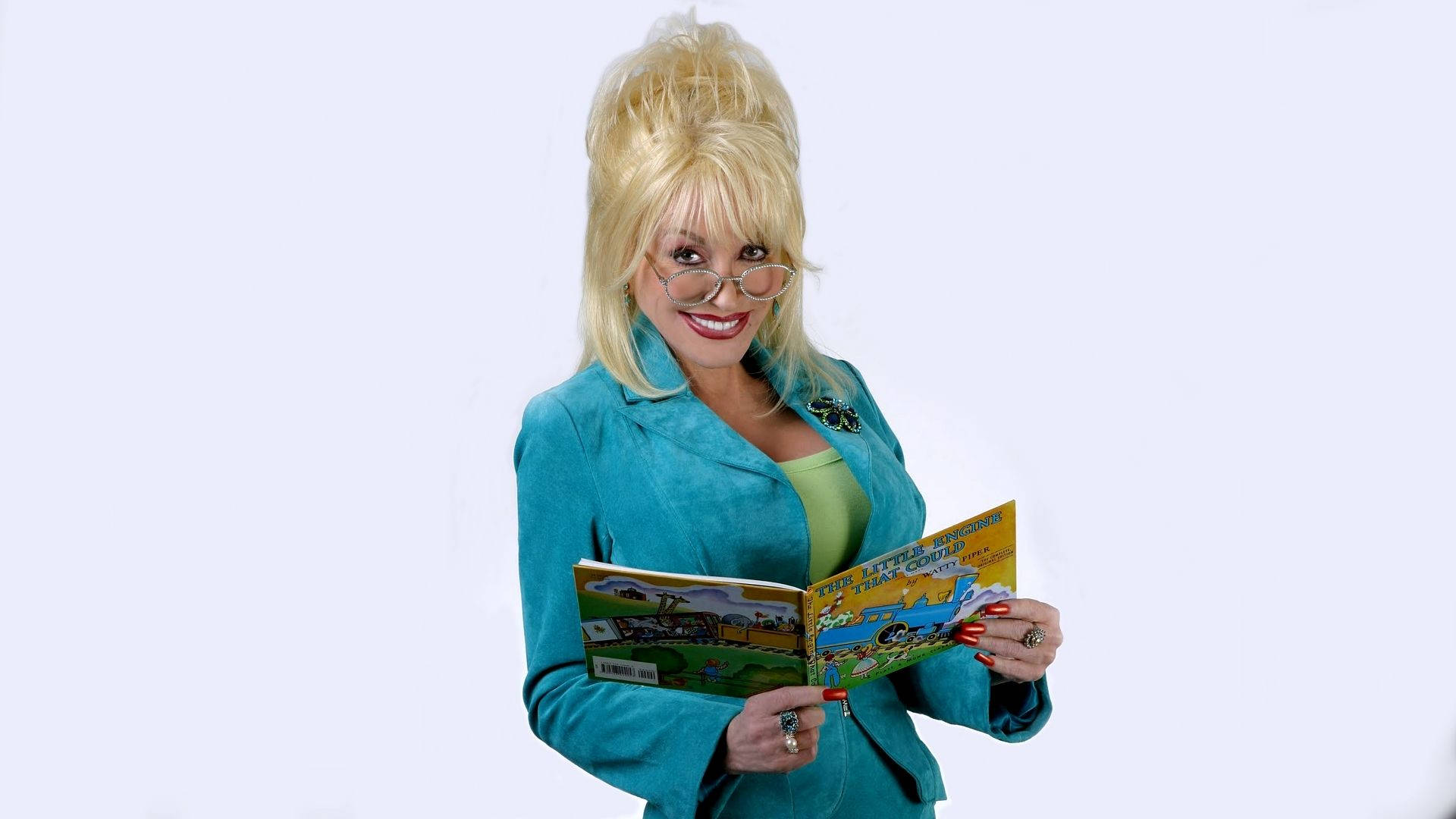 Dolly Parton Holding A Book Background