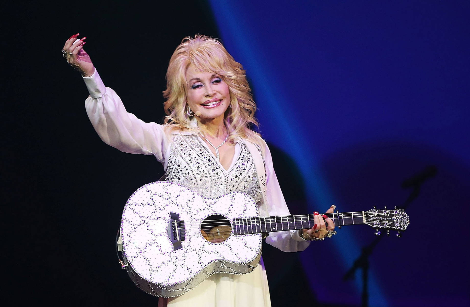 Dolly Parton Matching Guitar And Outfit Background