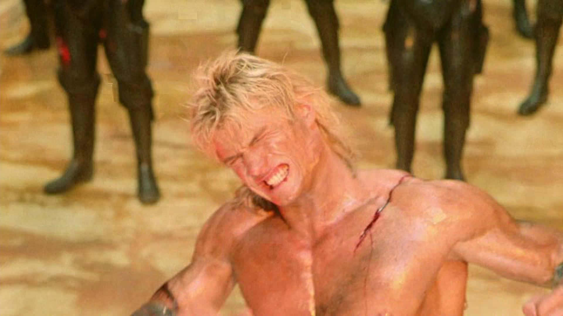 Caption: Dolph Lundgren: A Legendary Icon in Action Movies Wallpaper