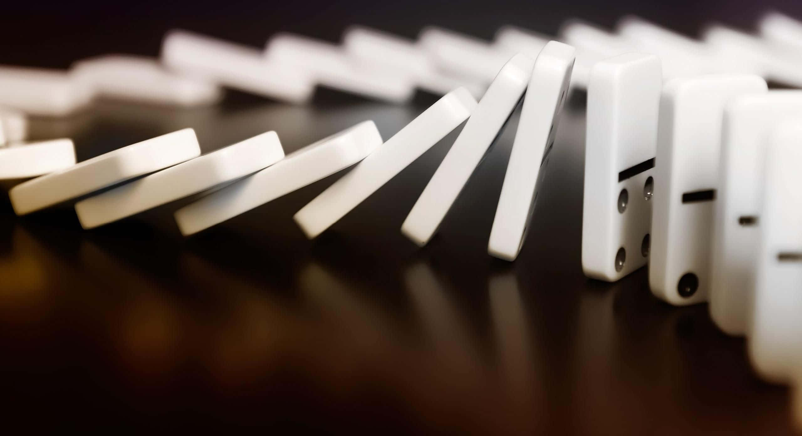 Stack of Dominoes in Motion