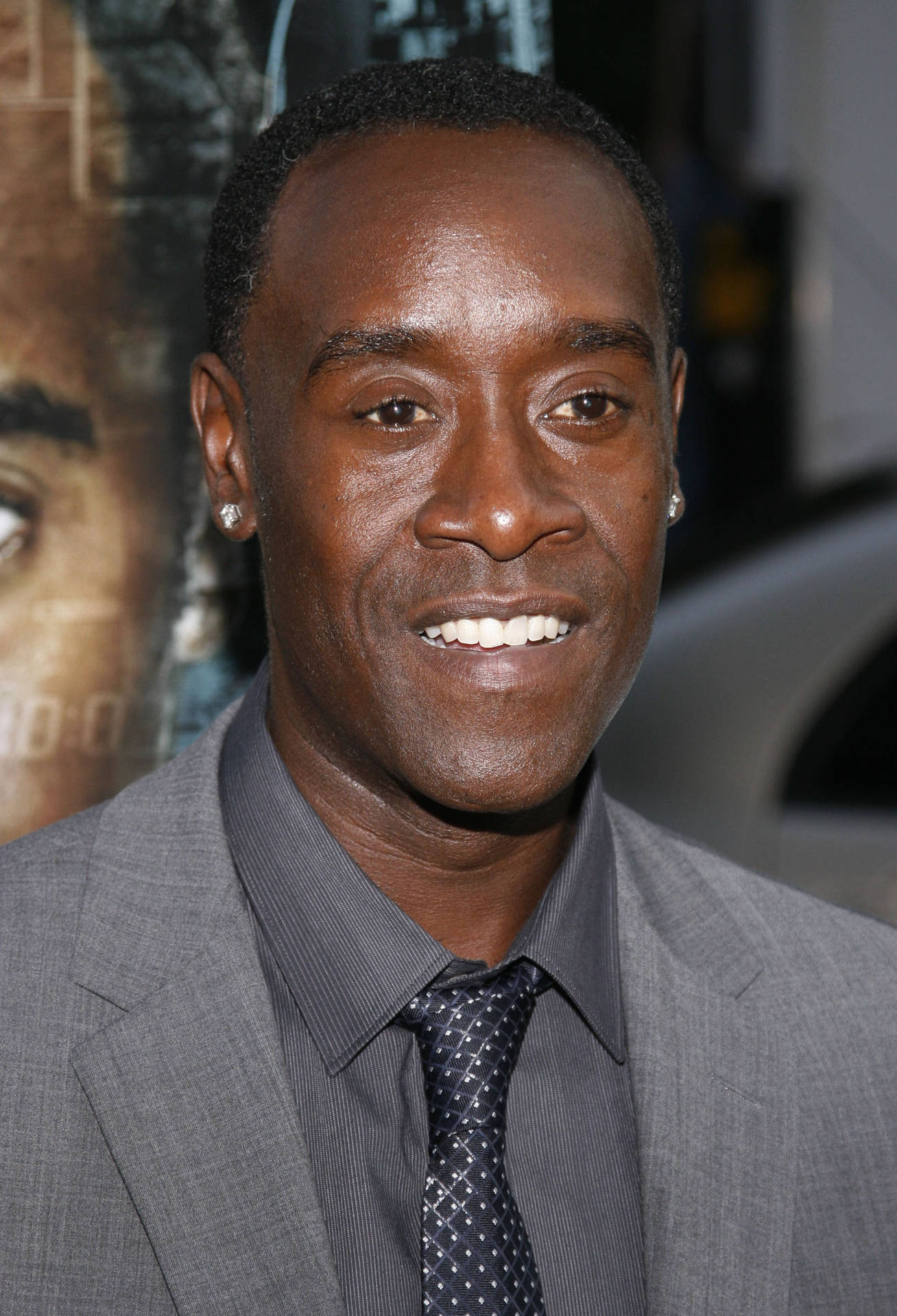 Don Cheadle In Grey Suit Wallpaper