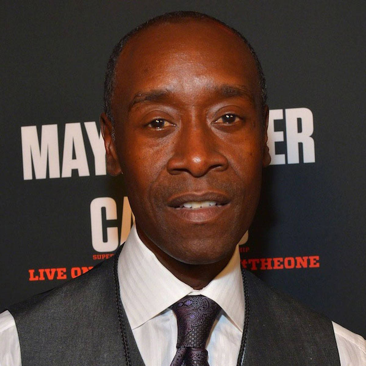 Hollywood star Don Cheadle in a screening room. Wallpaper