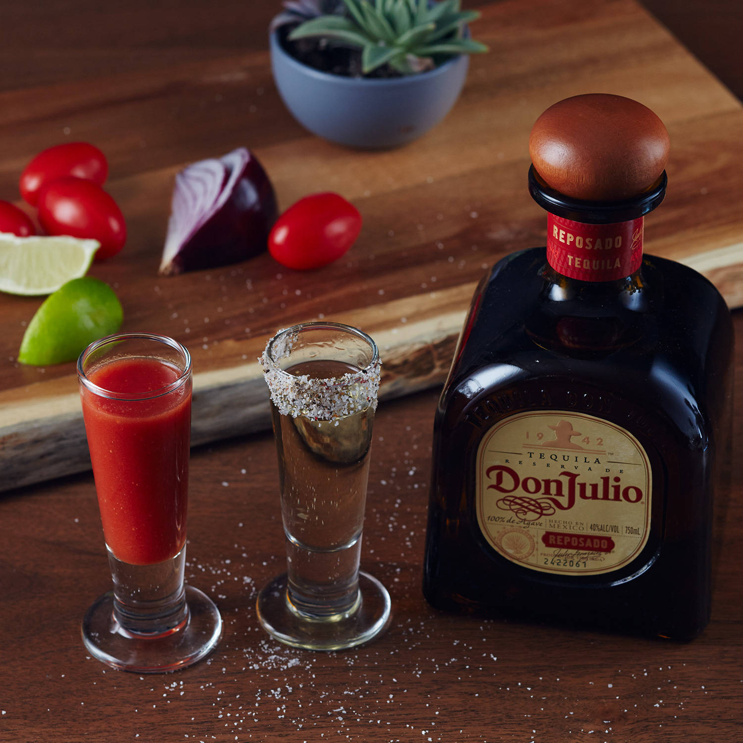Premium Don Julio Tequila Beside A Delicious Vegetable Mixture Wallpaper