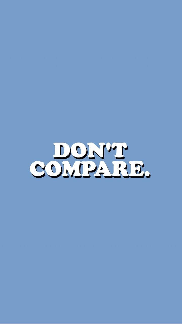 "Don't Compare" On Blue Aesthetic Quote iPhone Wallpaper