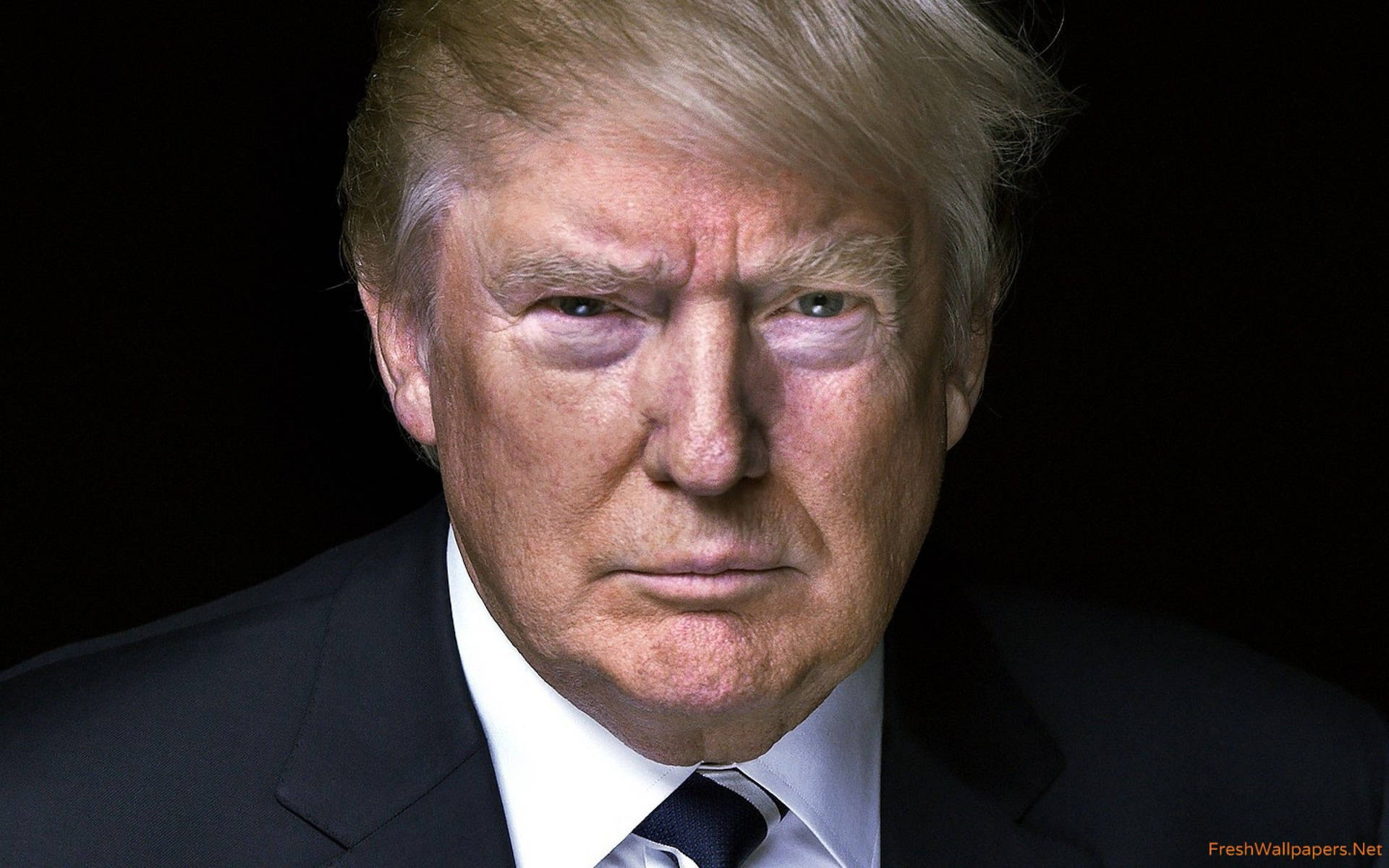 A closeup of President Trump squinting Wallpaper