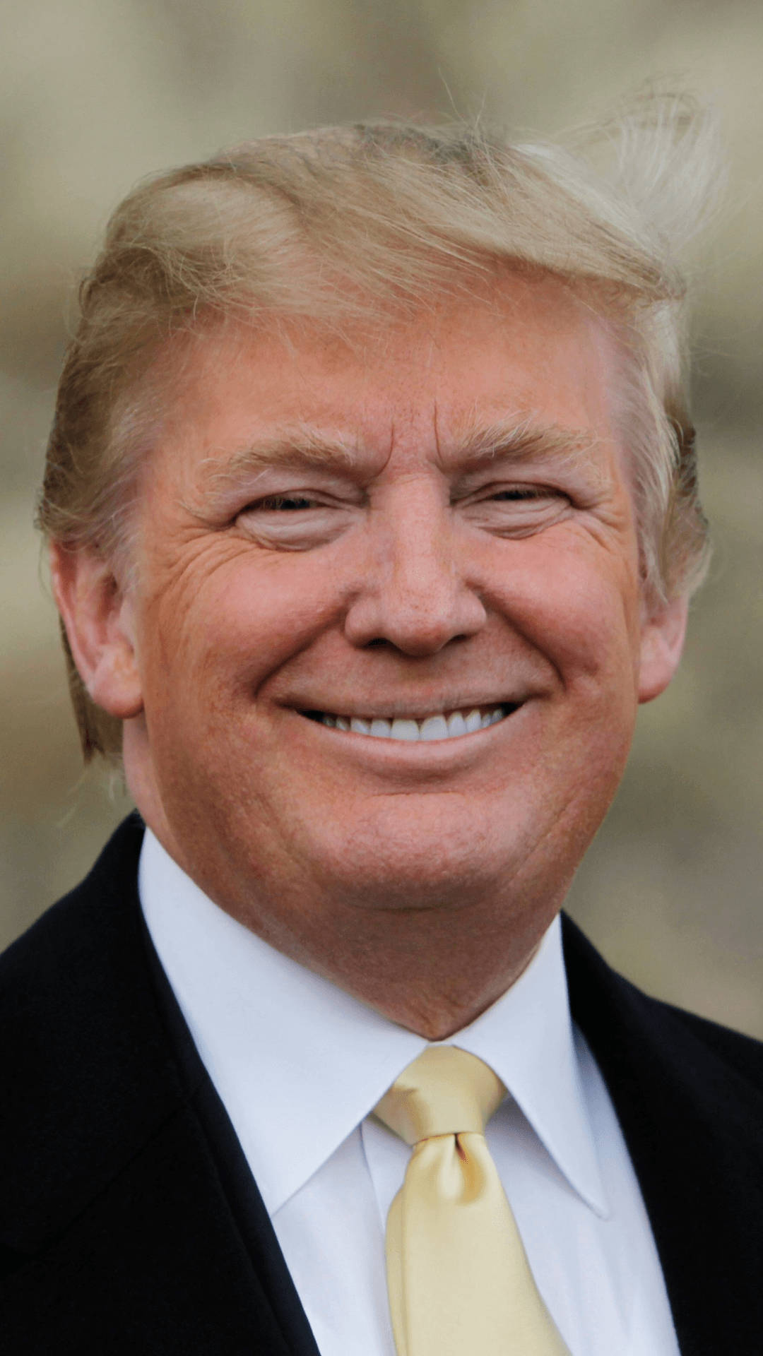 Donald Trump With Toothy Grin Wallpaper