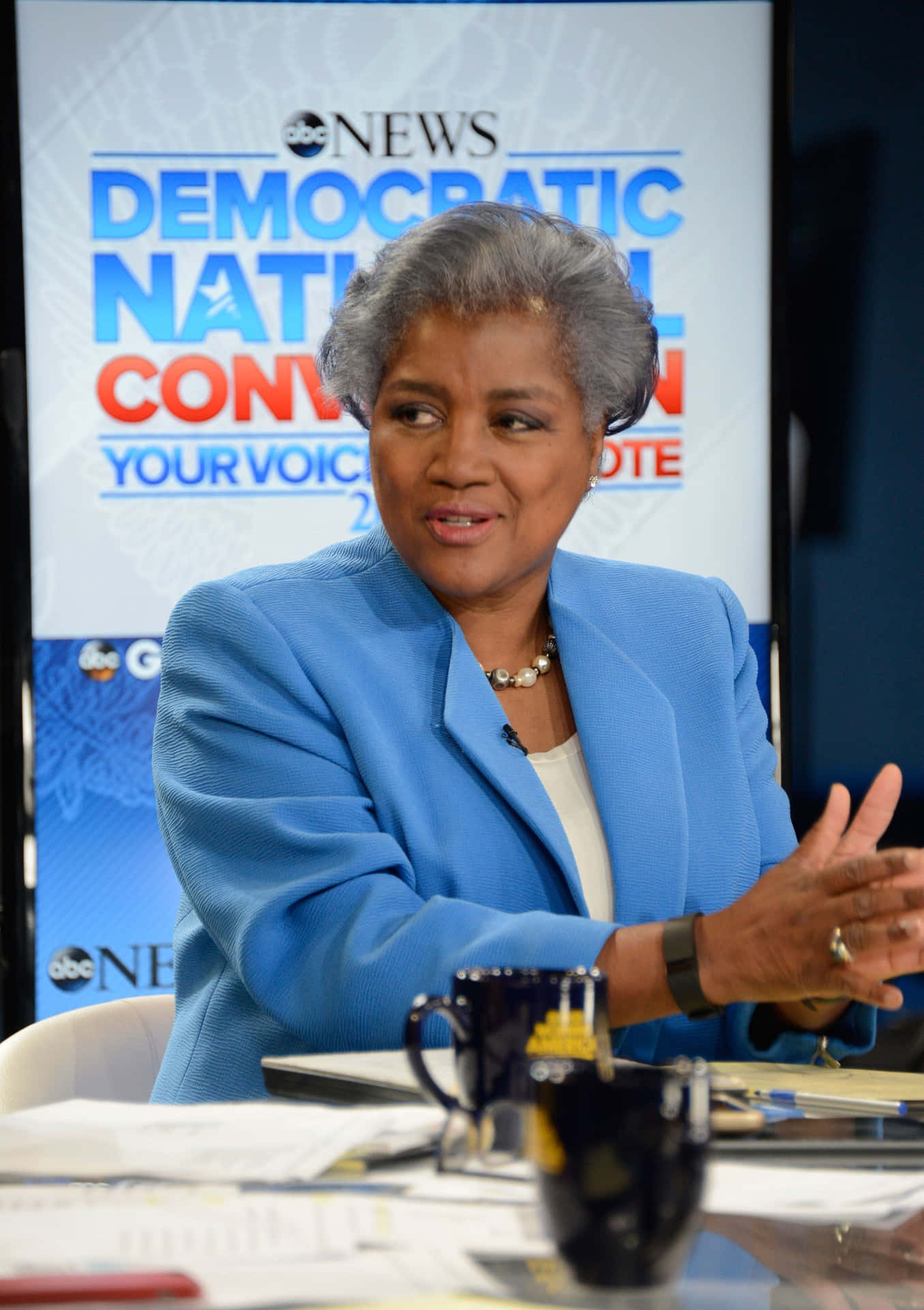 Donna Brazile Engaging In A Thoughtful Discussion Wallpaper