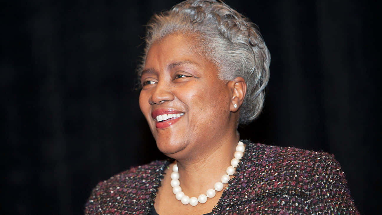 Donna Brazile Smiling At An Event Wallpaper
