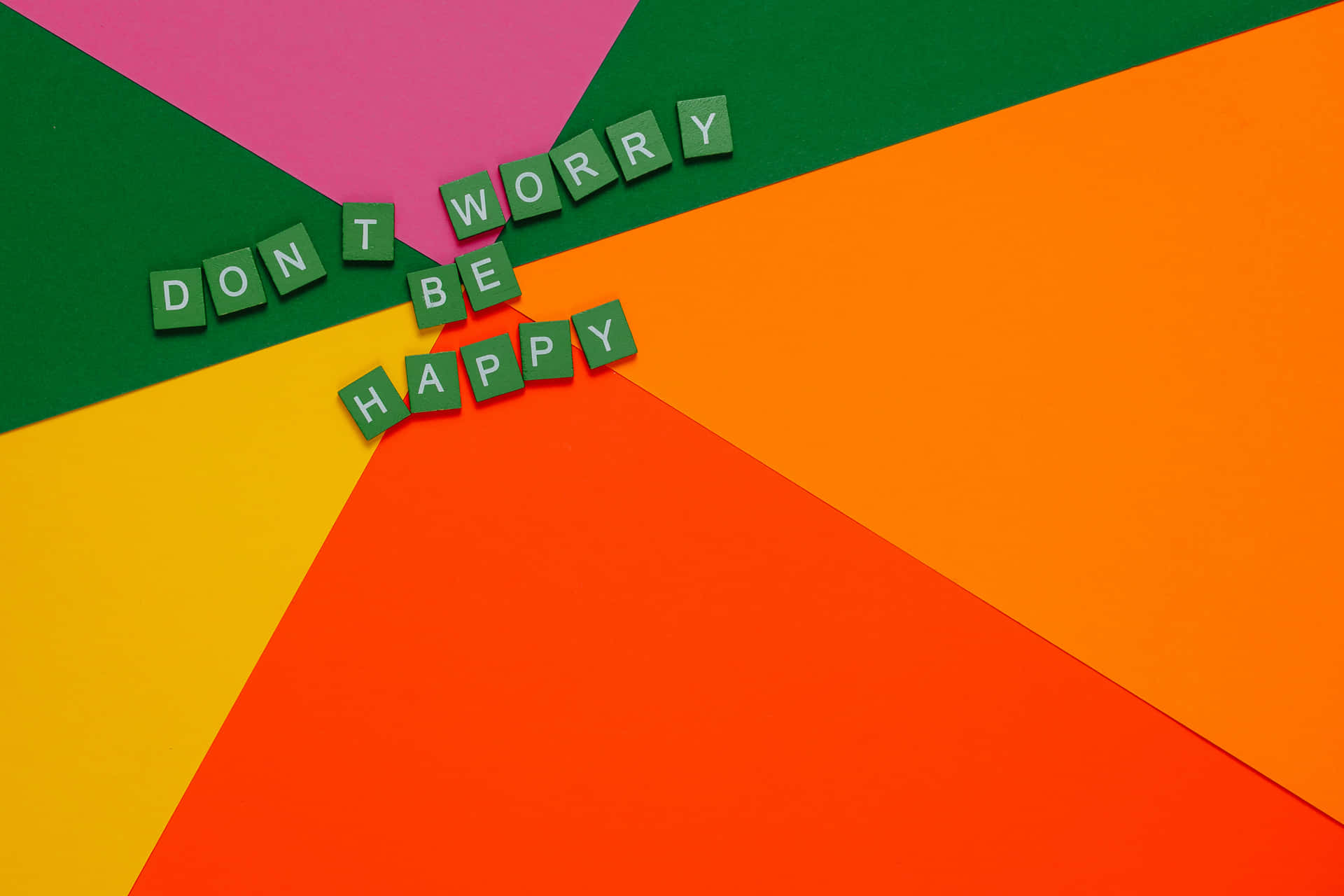 A Colorful Background With The Words Don't Worry Be Happy Wallpaper