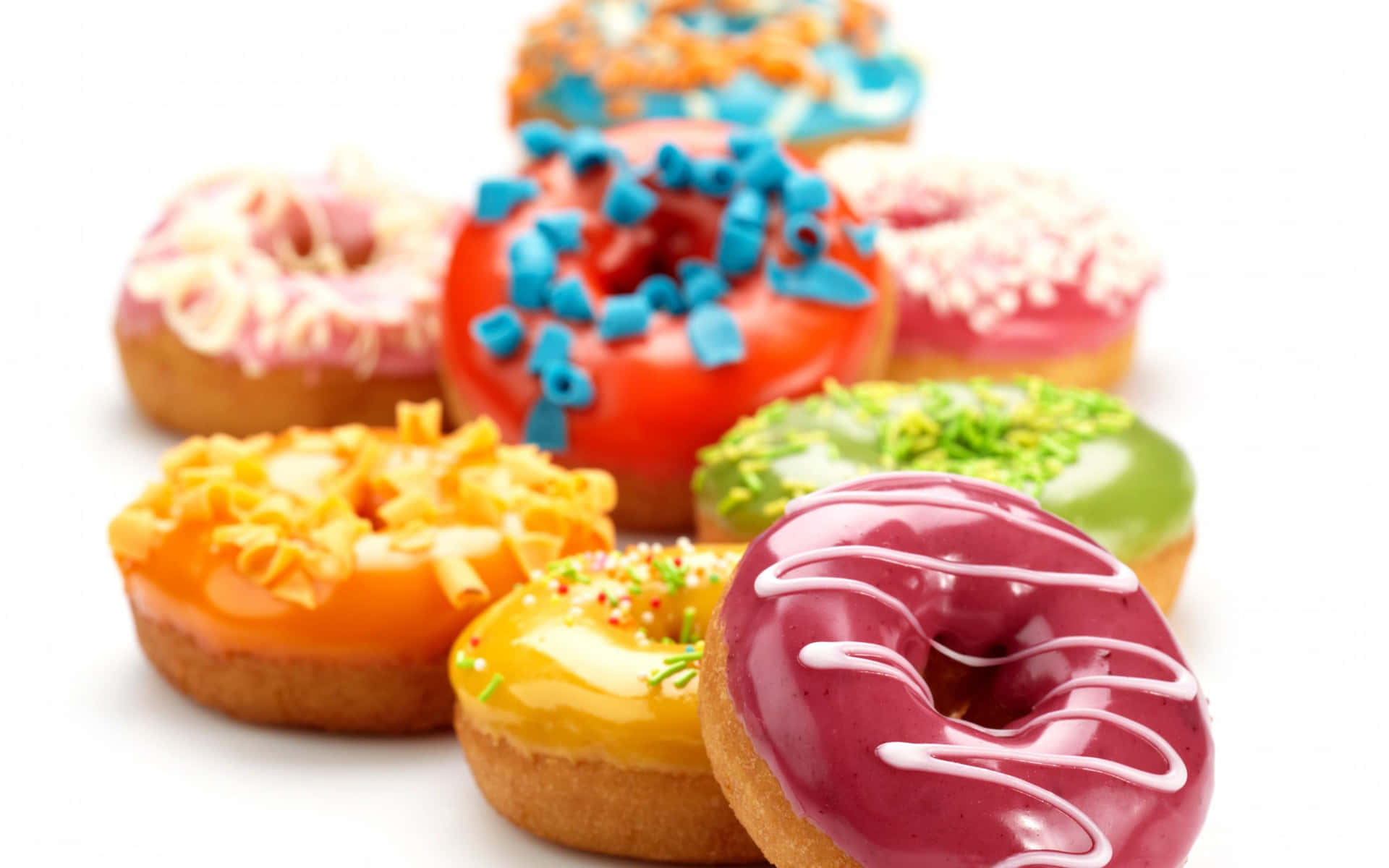 Colorful Donuts On A White Background