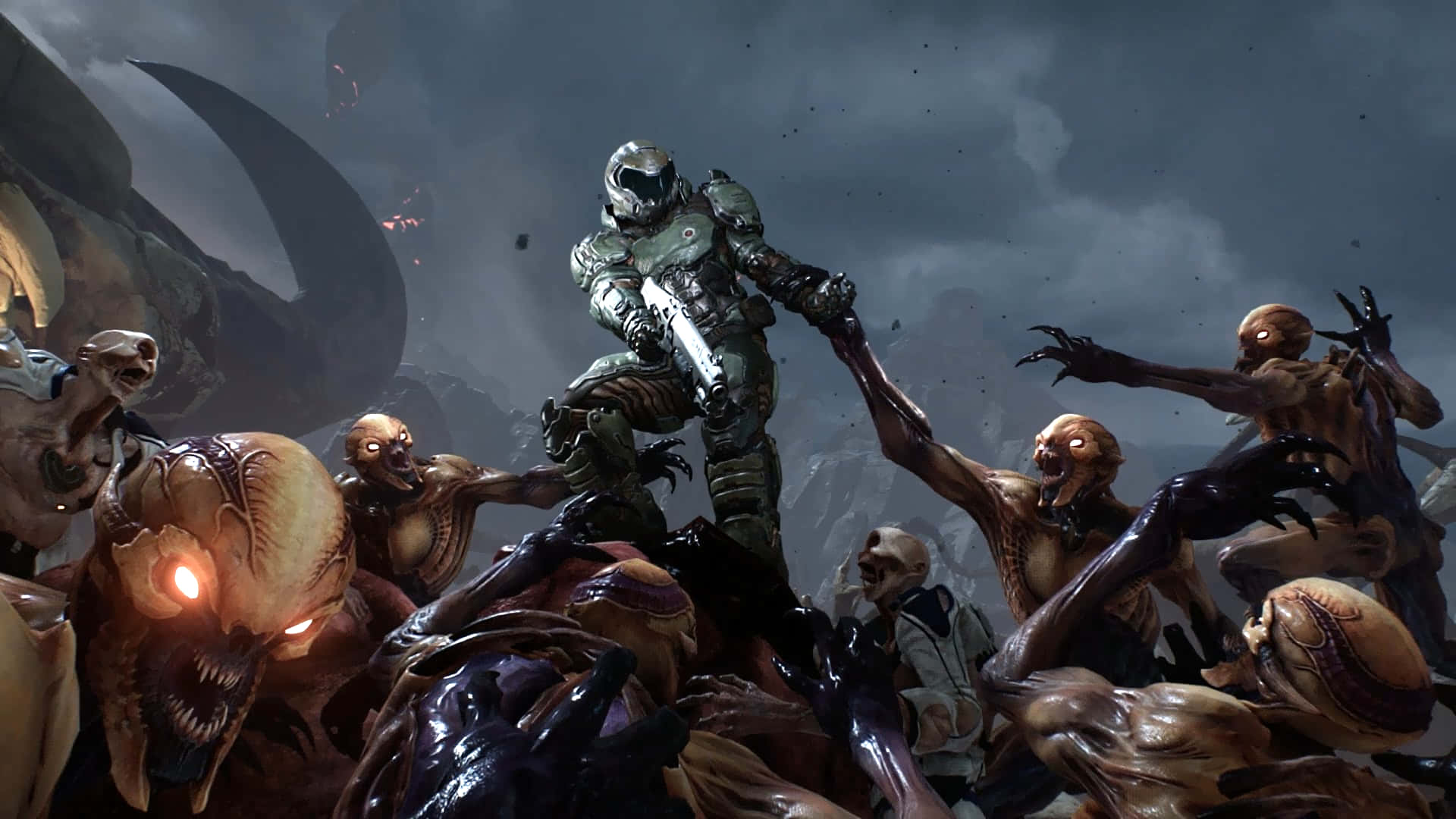 En mand står foran en gruppe af zombier. Wallpaper