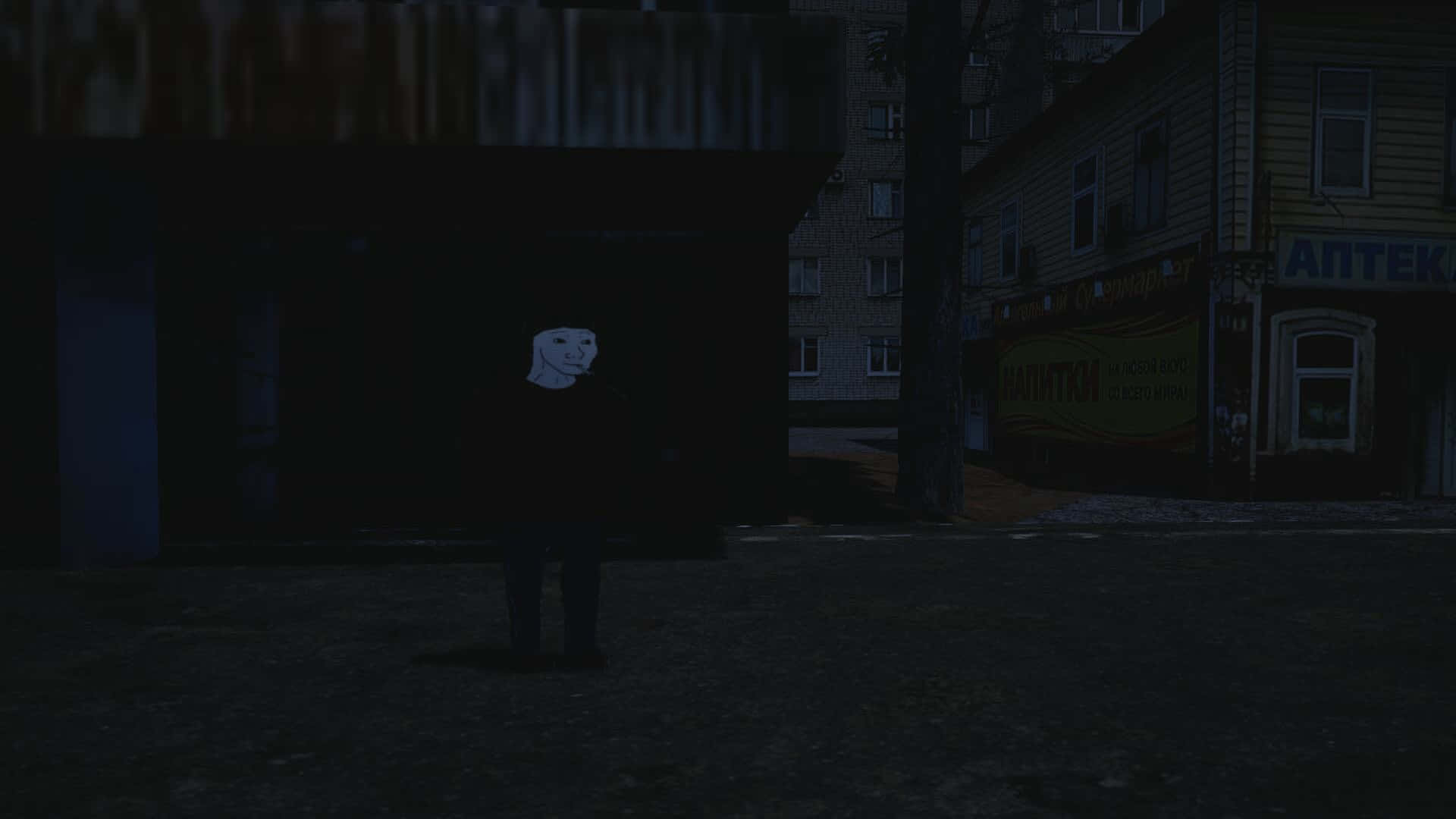 Unhombre Parado En Una Calle Oscura Fondo de pantalla