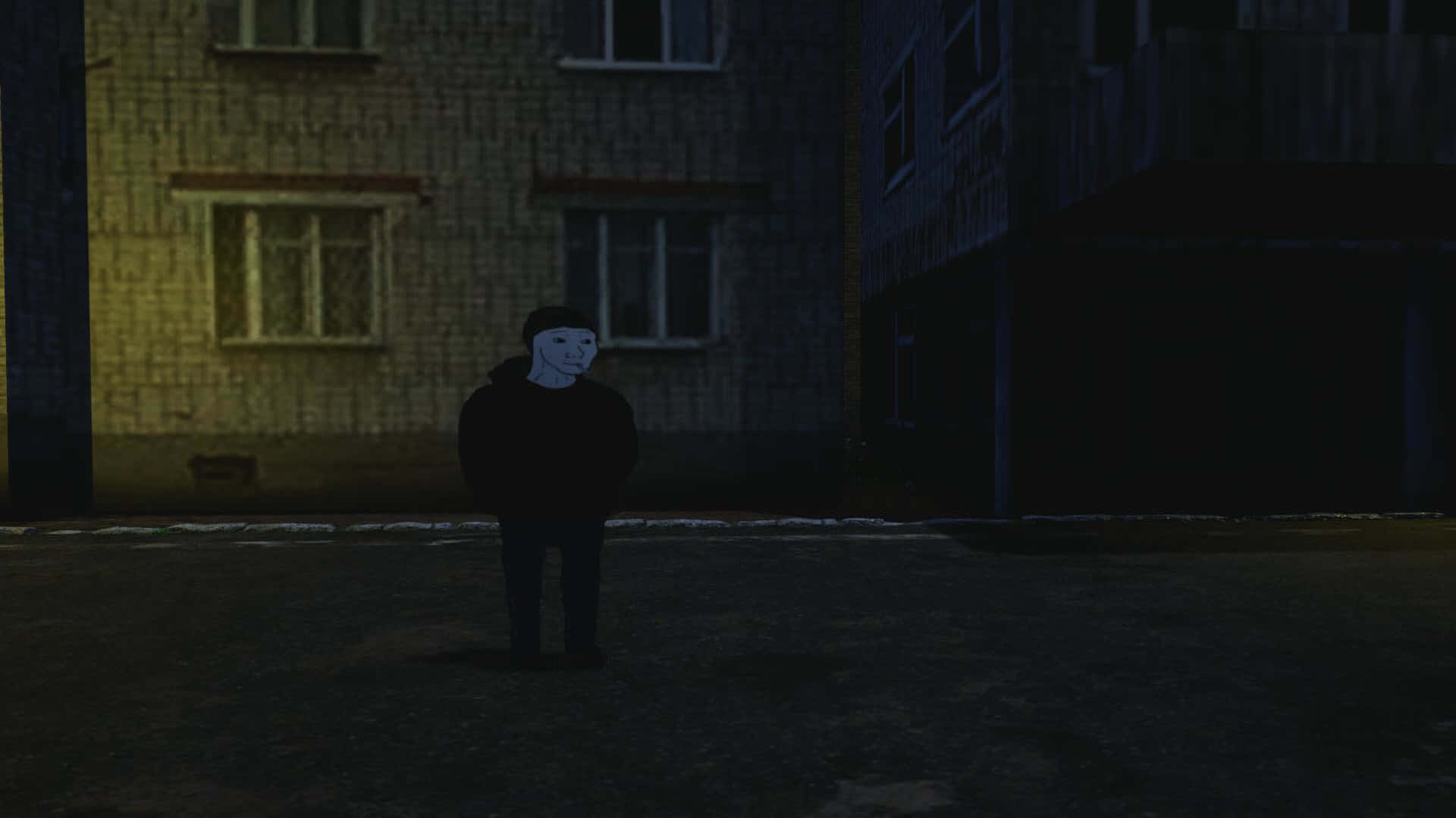 A Man Standing In A Dark Street At Night Wallpaper