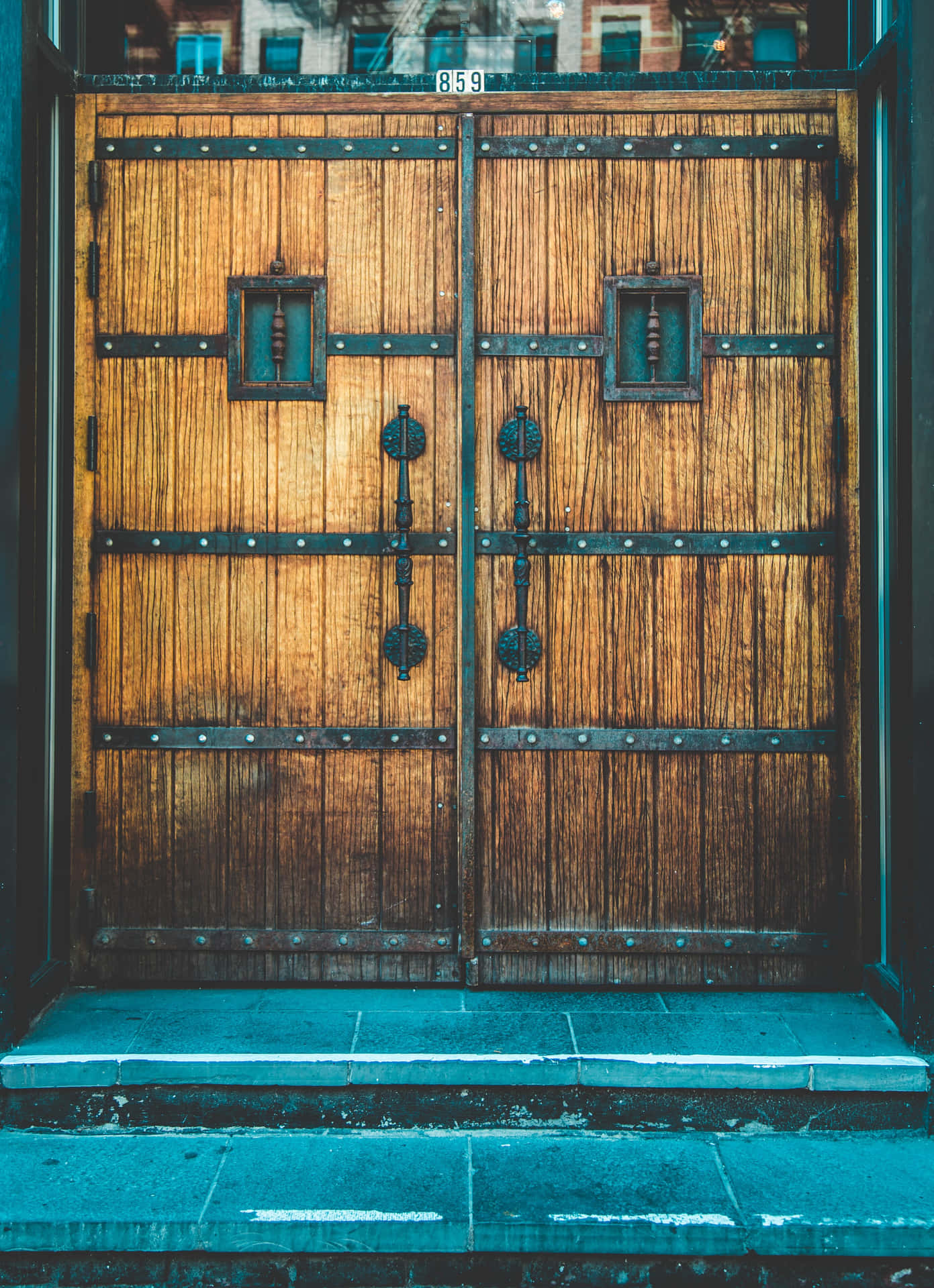 A Wooden Door With A Blue Background