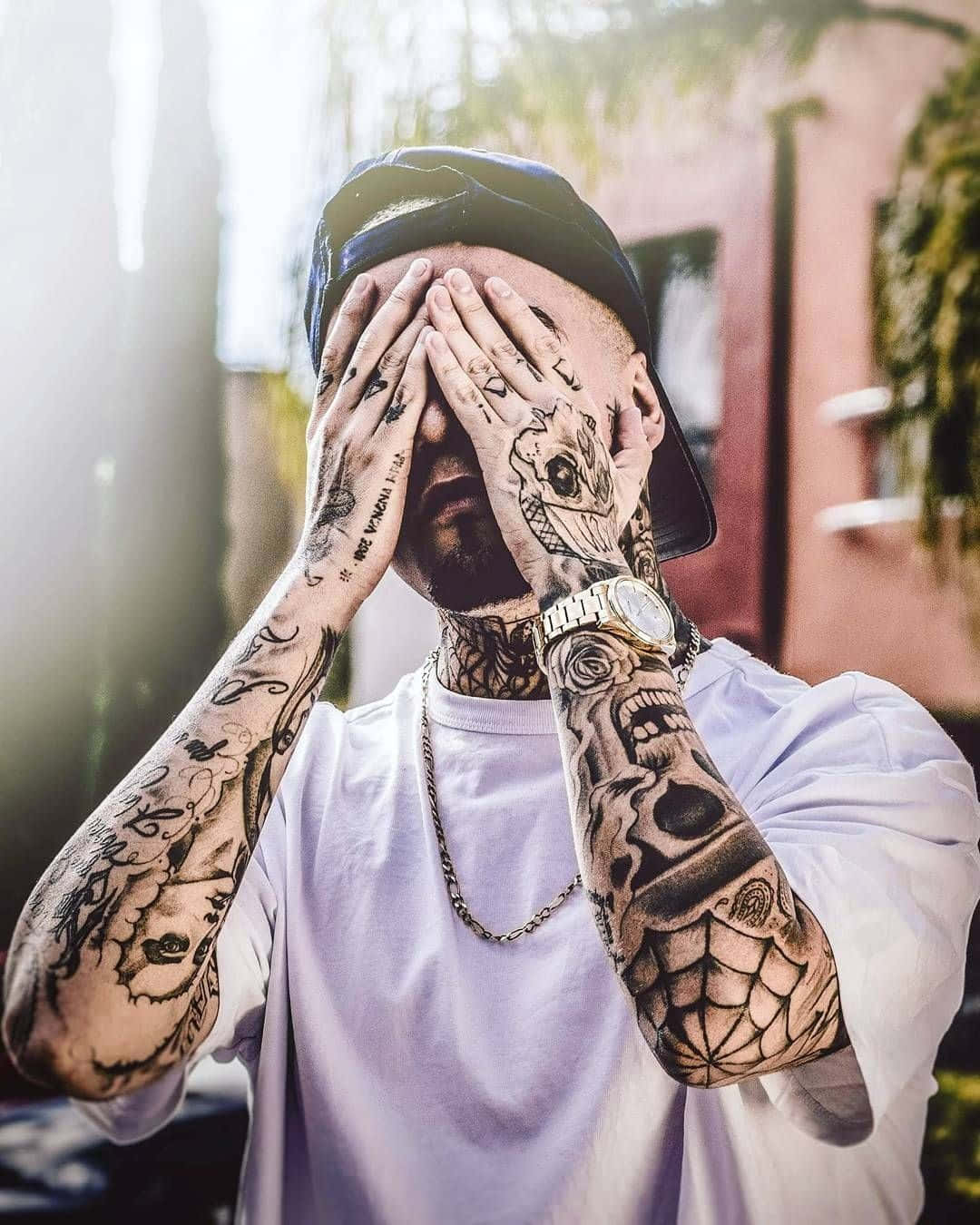 Download Dope Boy With Arm Tattoos Wallpaper