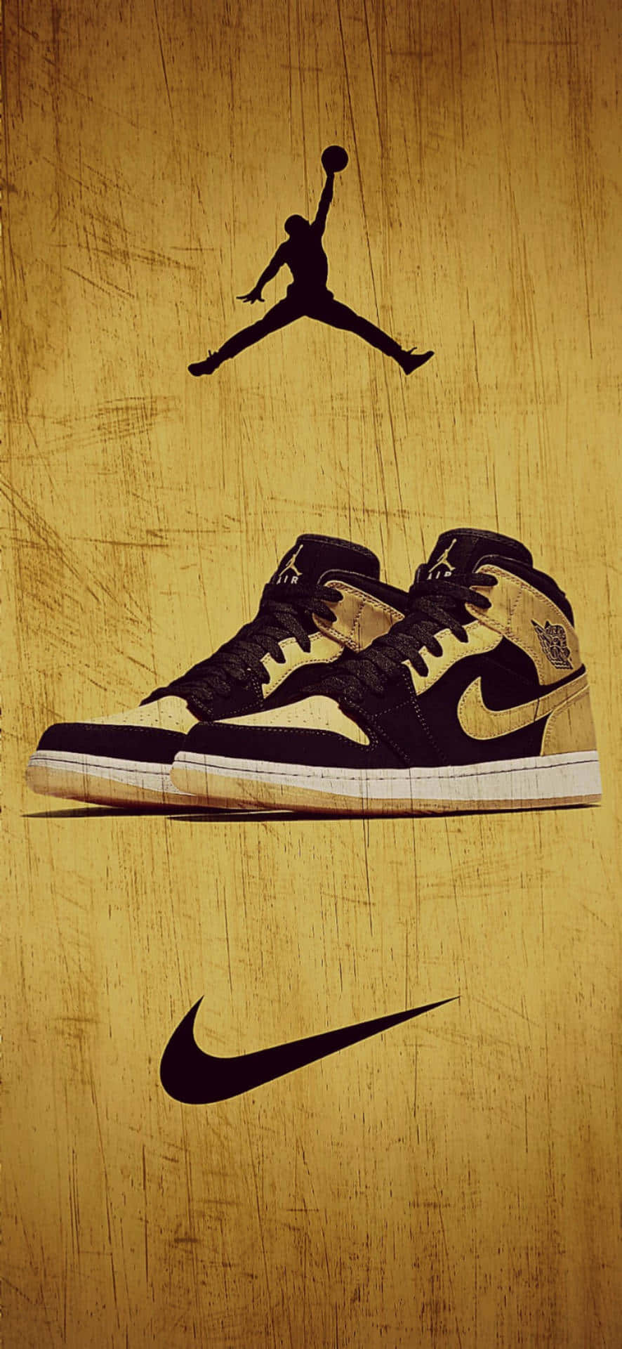 A Pair Of Gold And Black Jordan Shoes On A Brown Background Wallpaper