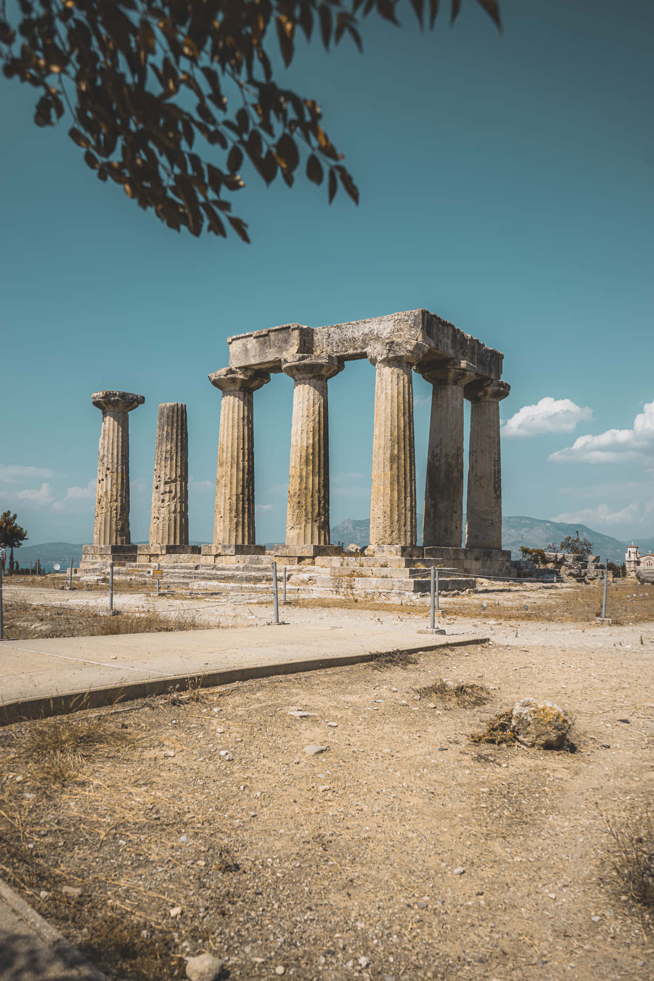 Doric Columns In Temple Of Apollo With Dark Filter Wallpaper