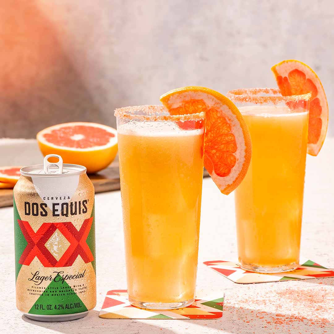 Dos Equis Bier Met Grapefruit Garnituur Achtergrond