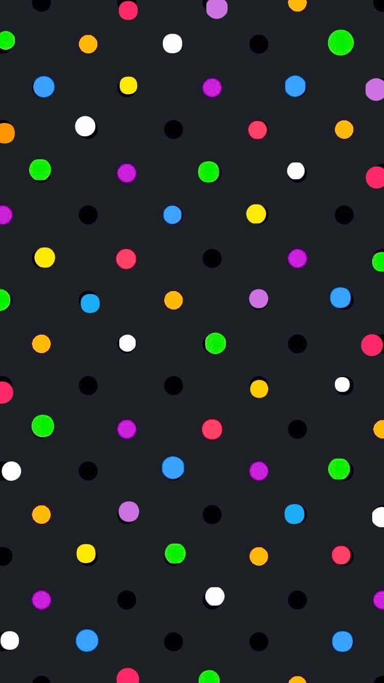A Colorful Polka Dot Pattern On A Black Background