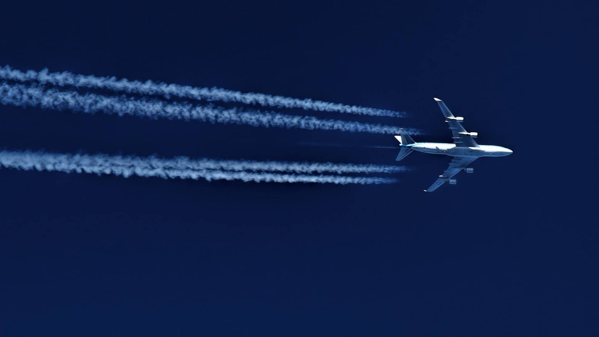 Double Lines White Trails Of Airplane 4K Wallpaper