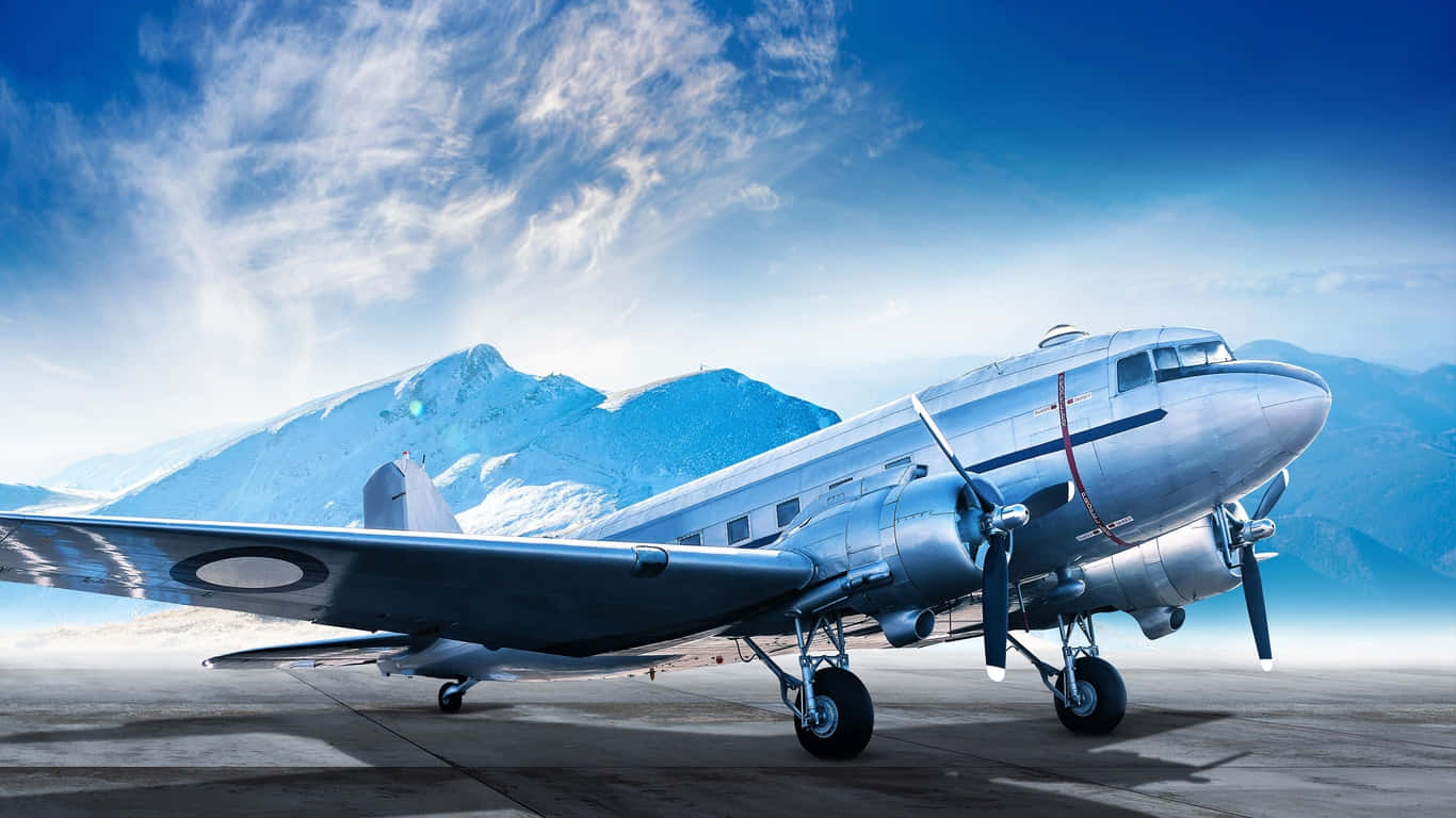Douglas Dc-3 Small Airplane In Icy Mountain Wallpaper