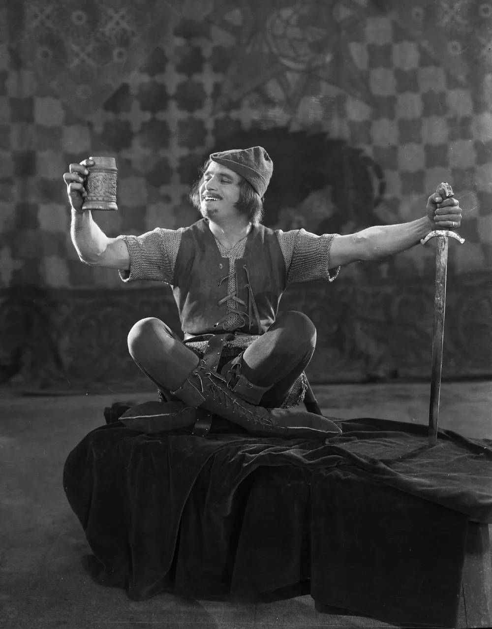 Classic Hollywood Icon - Douglas Fairbanks Holding Sword Wallpaper