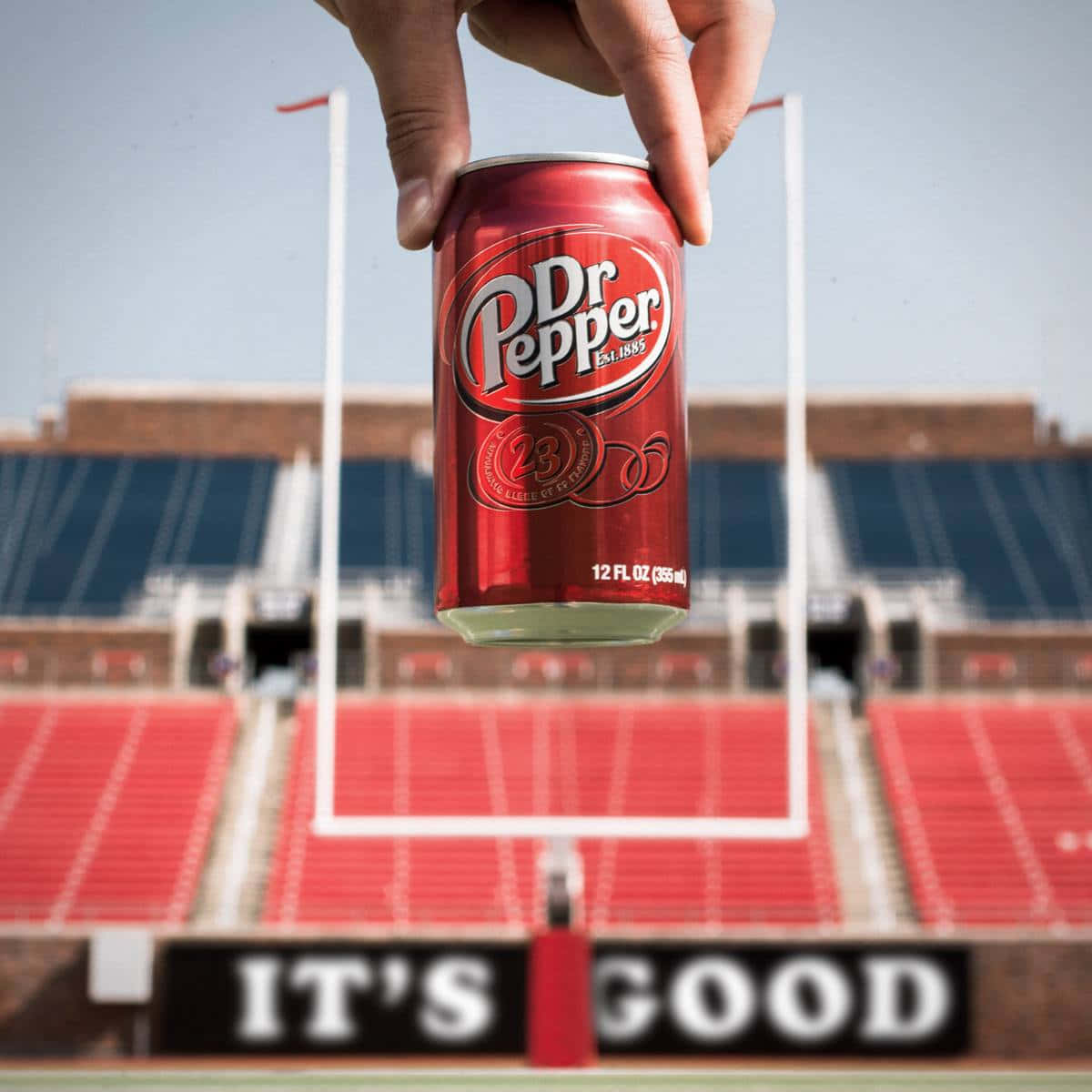 Dr Pepper Can Held Upat Stadium Wallpaper