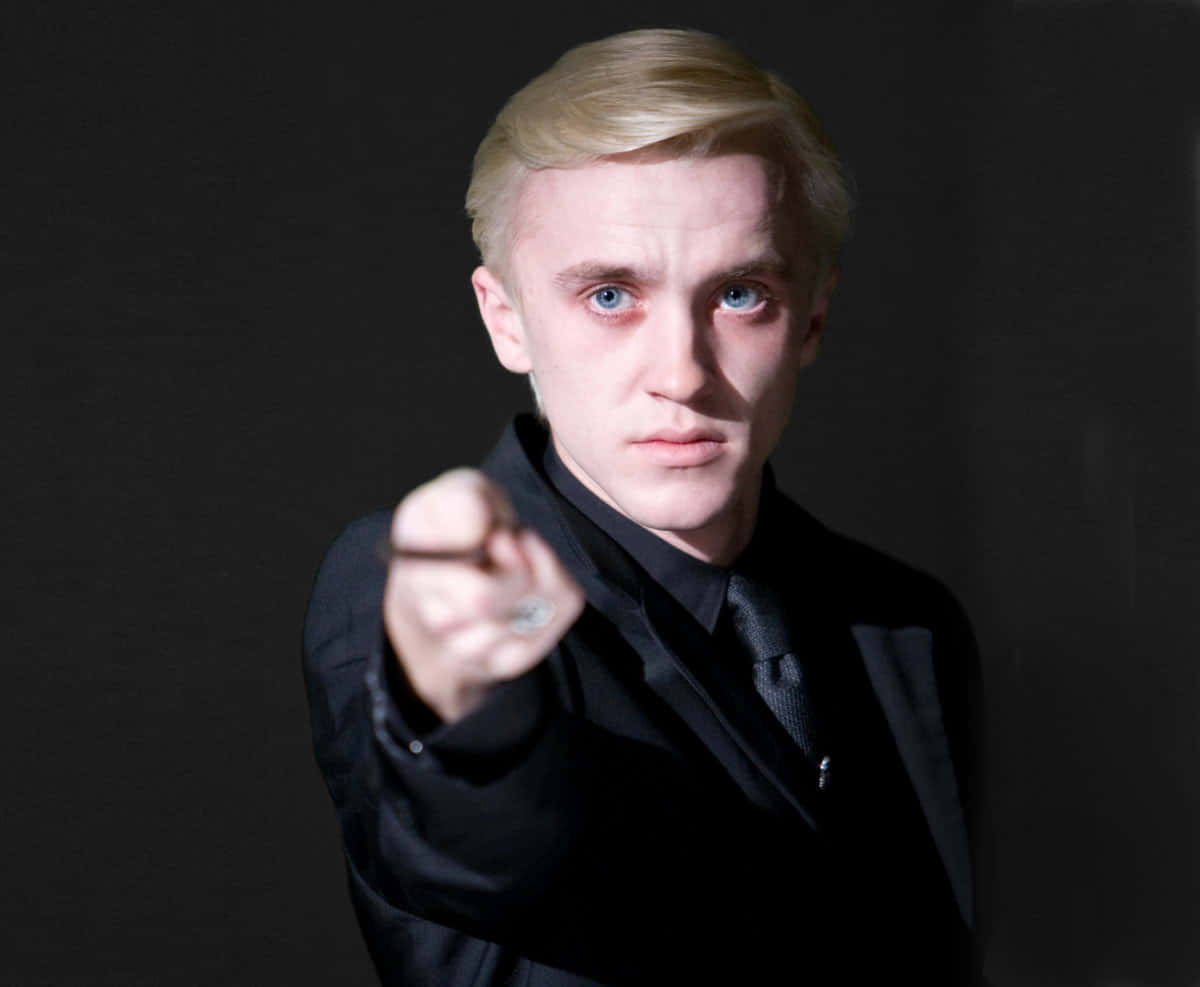 Draco Malfoy in his school robes.