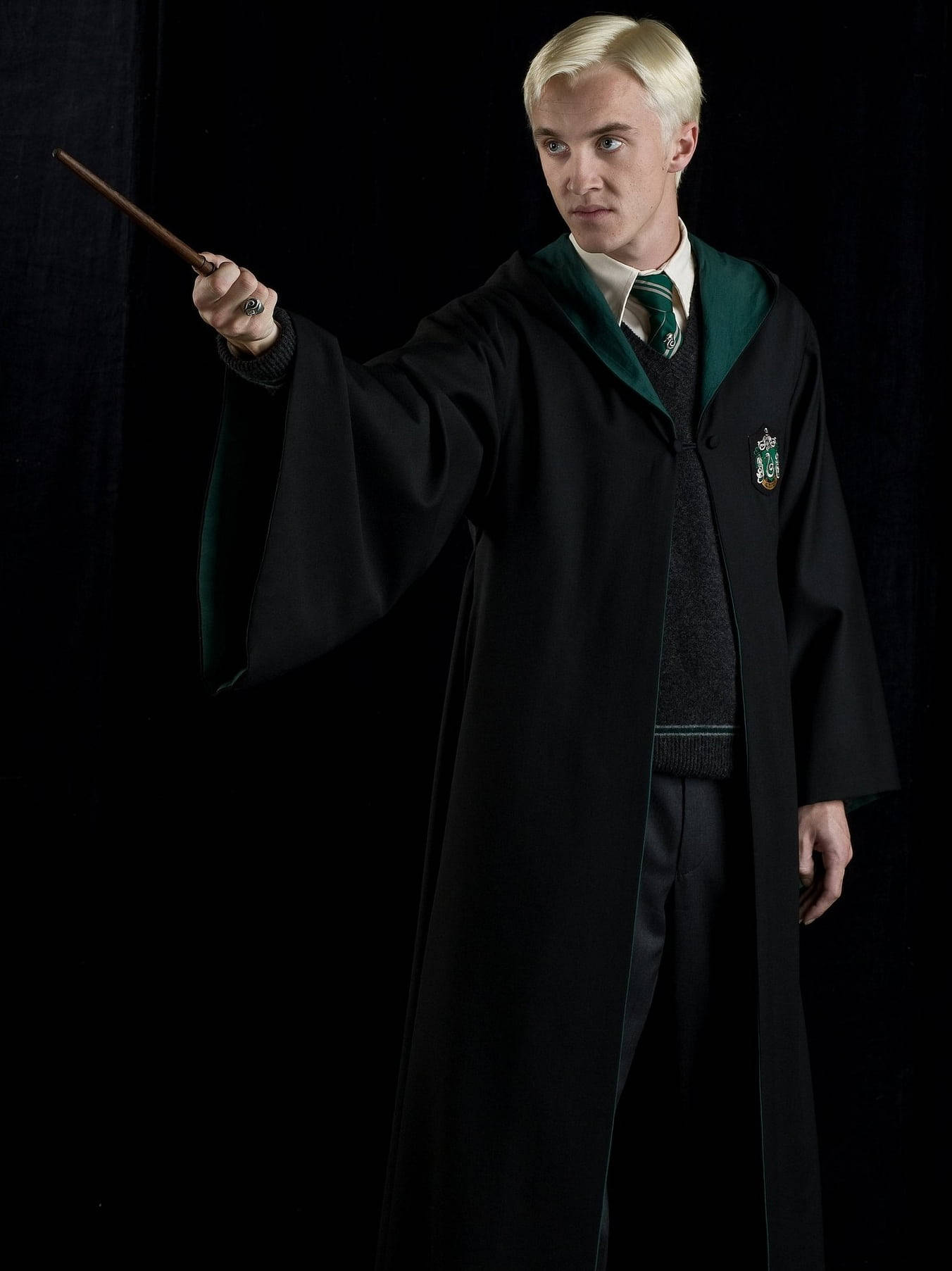 Draco Malfoy In Hogwarts Uniform Background