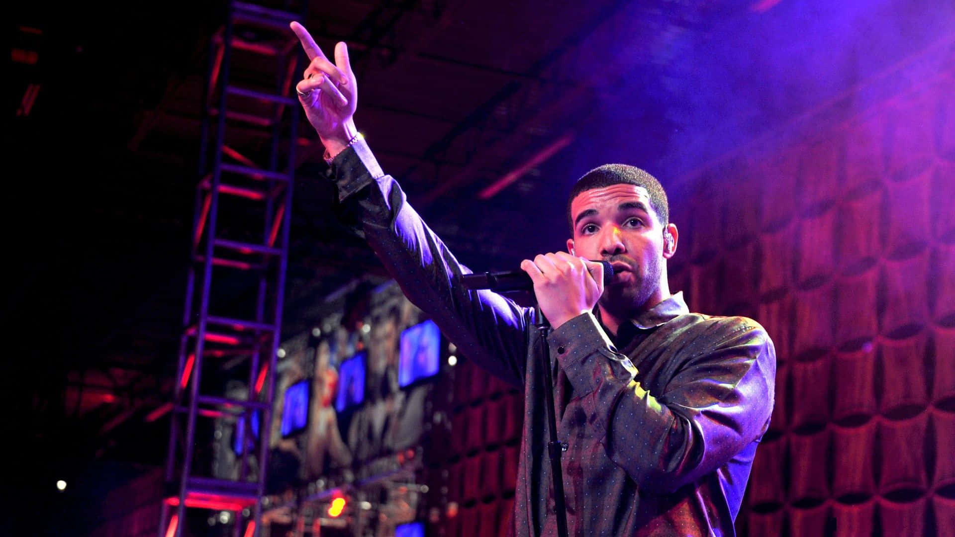 Drake confidently performing on stage