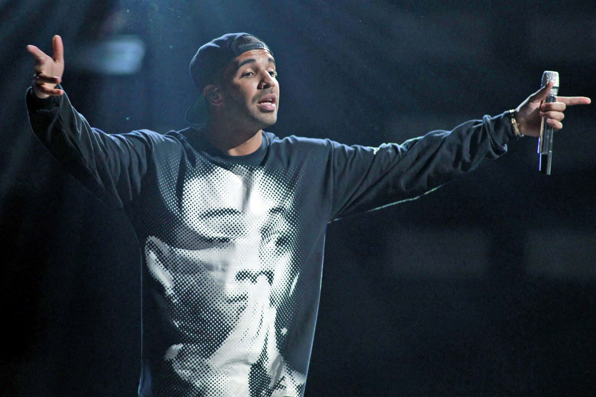 Canadian rapper Drake exuding confidence on stage