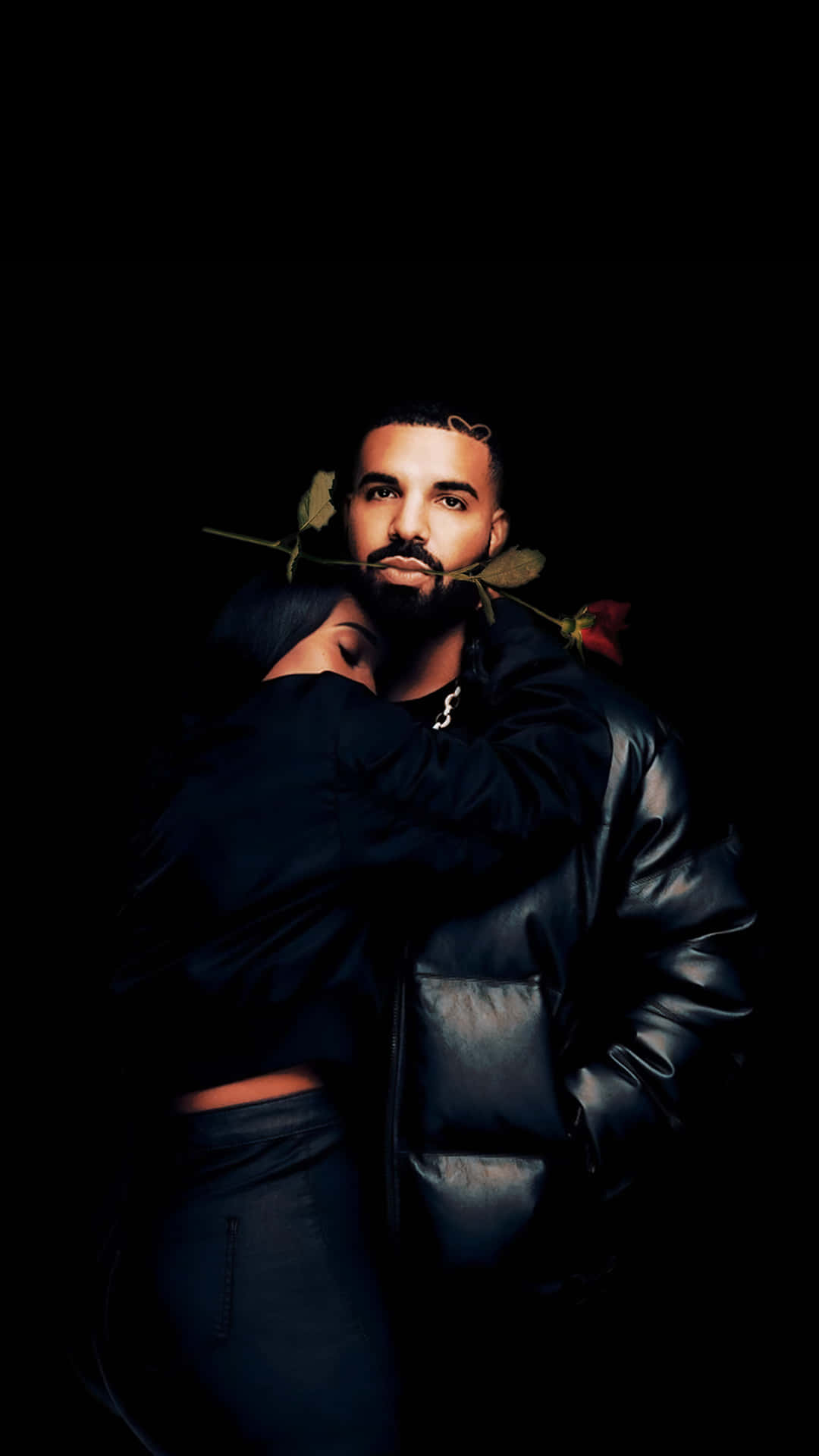 Drake And A Woman Hugging Each Other Wallpaper