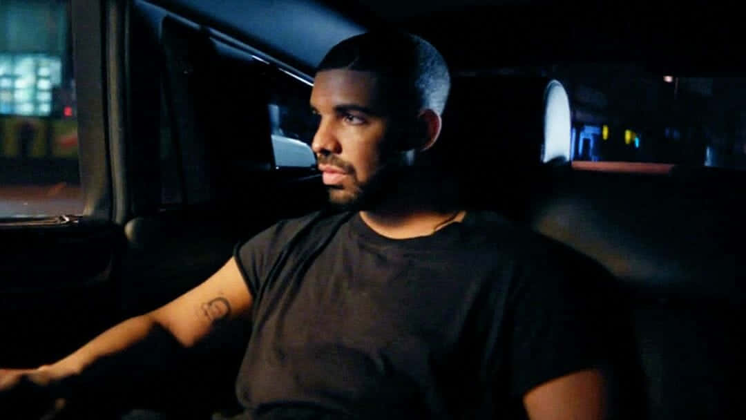 Drake In The Back Seat Of A Car Wallpaper
