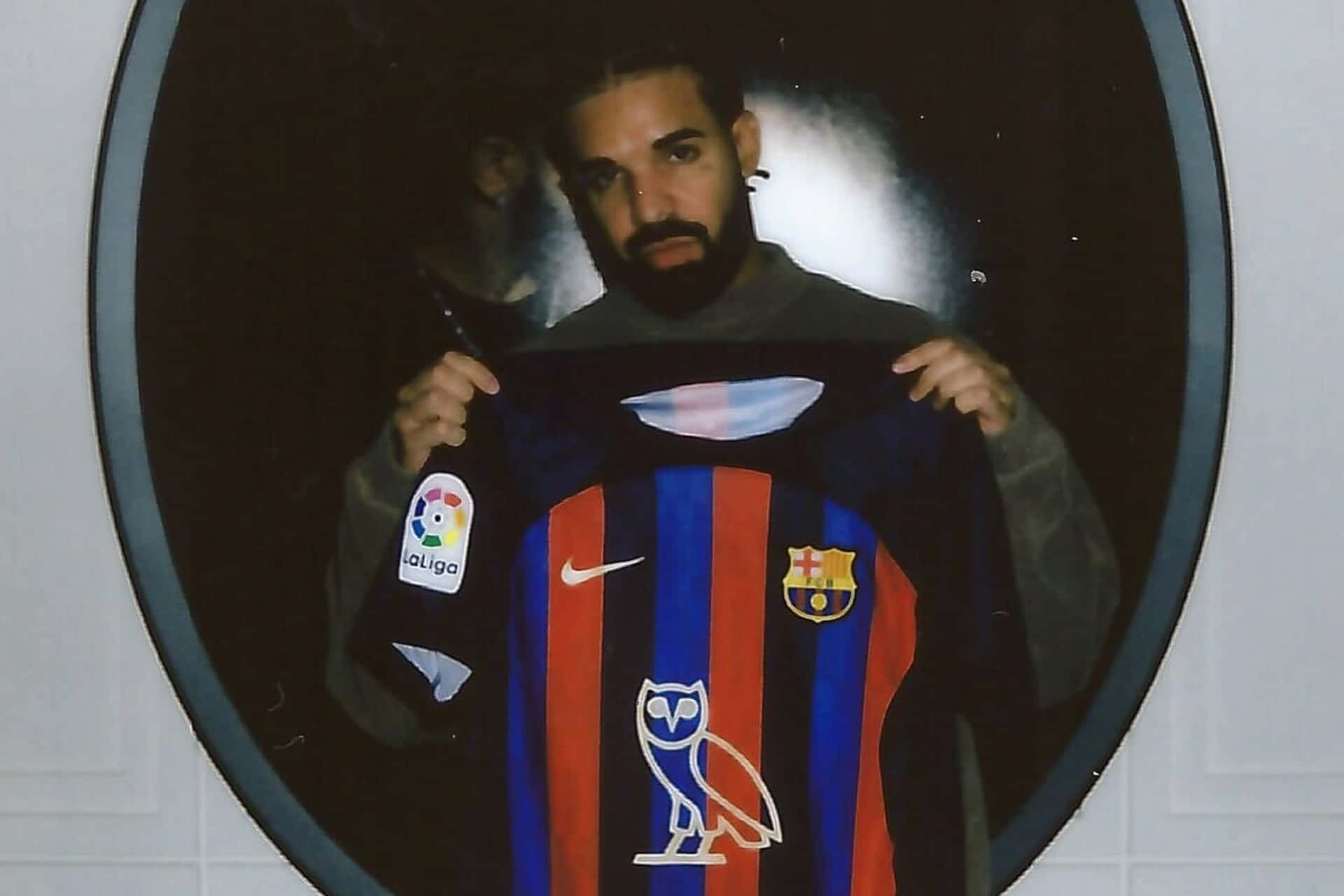 Drake Holding O V O Barcelona Jersey Wallpaper