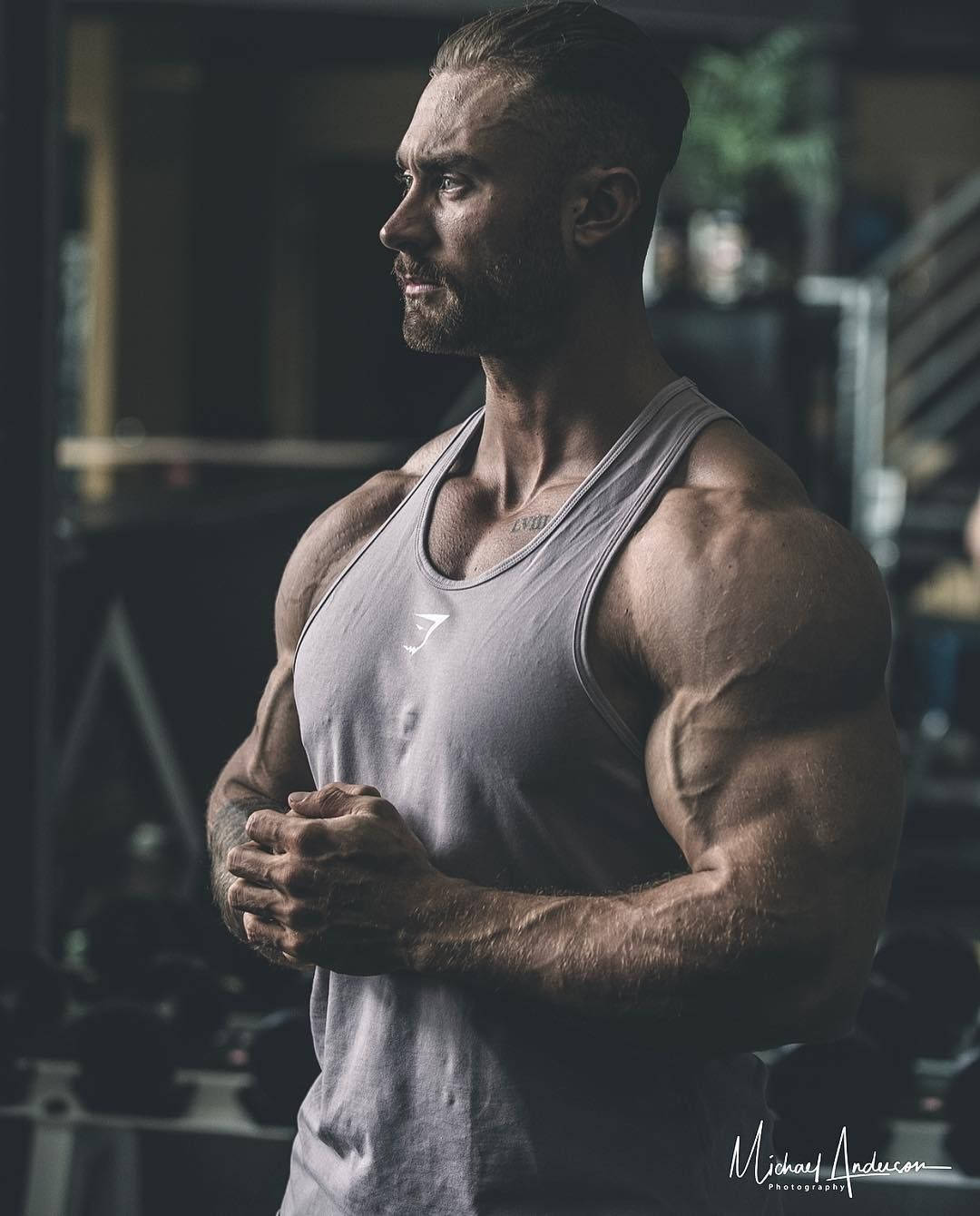Dramatic Side Profile Of Chris Bumstead Wallpaper
