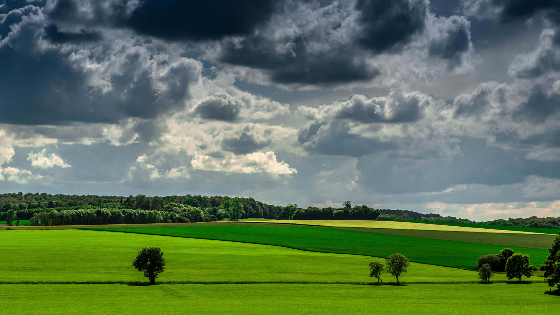 Dramatic Summer Sky Over Green Fields4 K Ultra Wide.jpg Wallpaper